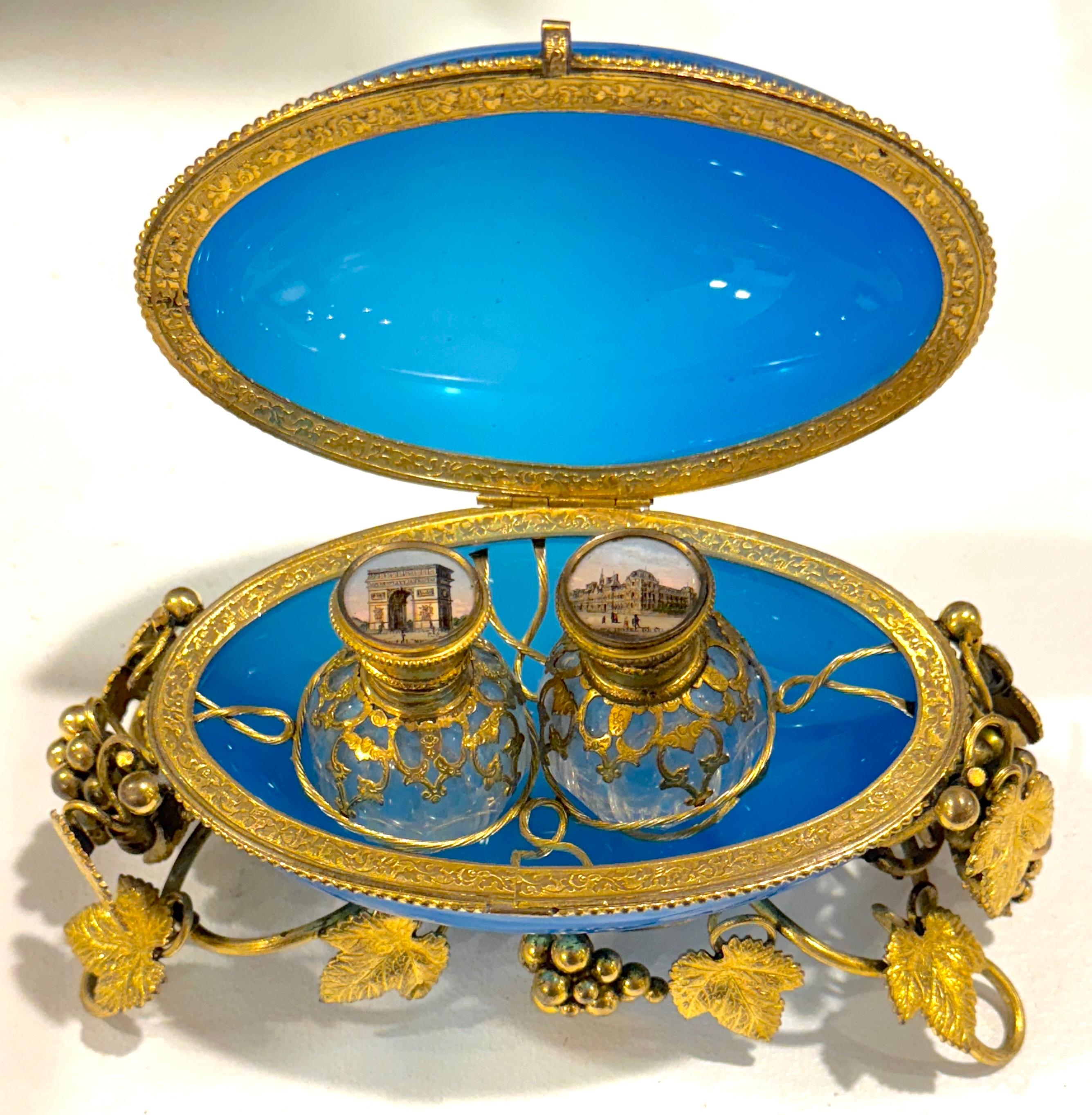 Napoleon III Blue Opaline “Egg in Nest” Perfume Casket with Paris Views, Palais Royal, Paris, circa 1860–1880

A superb French Napoleon III blue opaline glass and ormolu-mounted perfume casket, crafted in Paris circa 1860–1880 and retailed at the