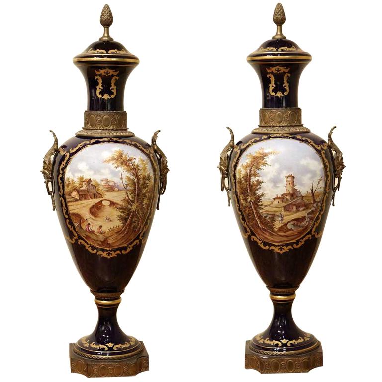 Napoleon III Blue Royal Lidded Vases Hand Painted Landscapes and Bronze Handles For Sale