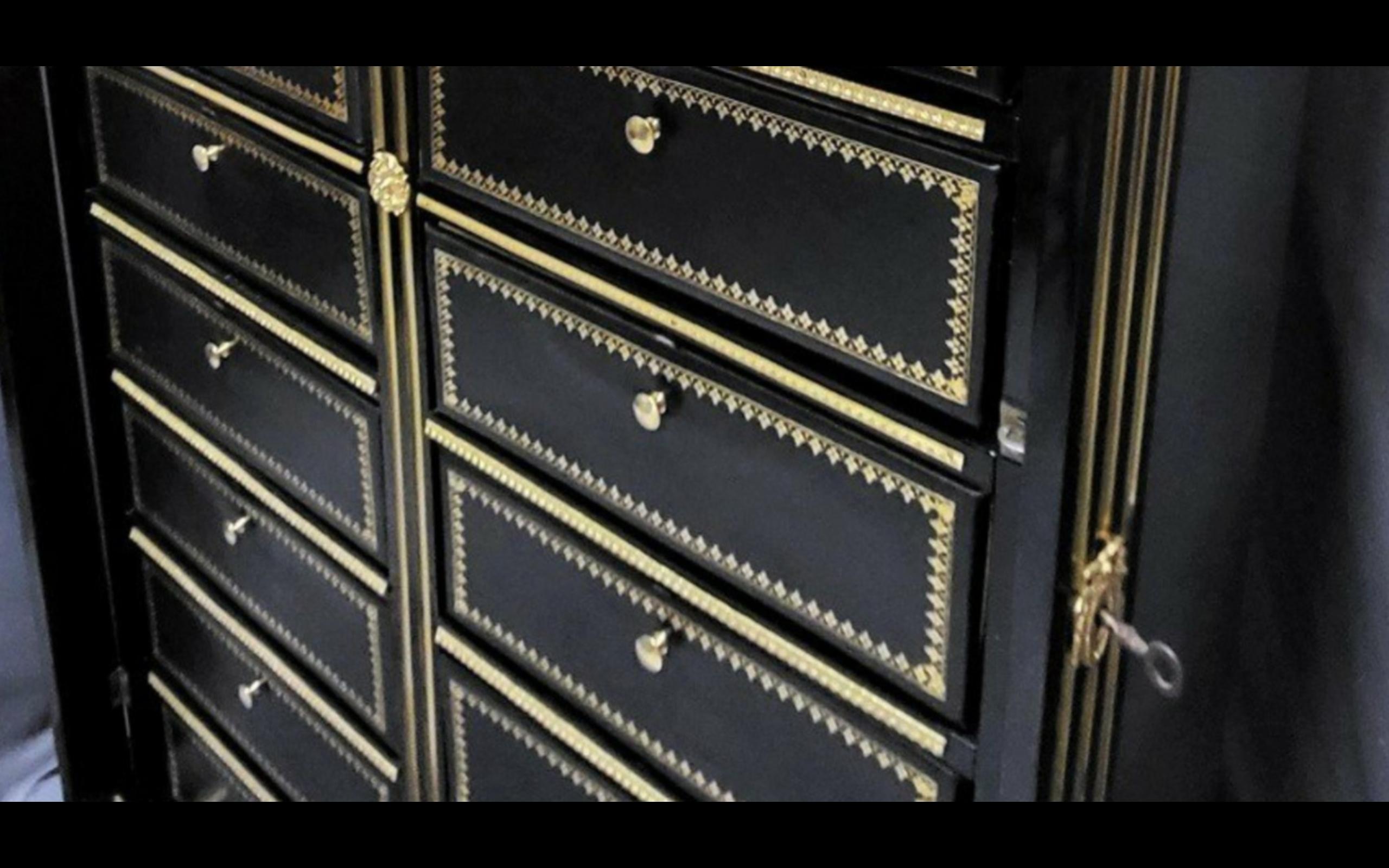 Rare, large and tall notary cardboard boxes cabinet, Napoleon III period around 1870, with rich ornamentation of gilded bronzes such as high and low drops, ingot molds, rosettes, keyholes. Stunning model with 20 thick cardboard boxes with its front
