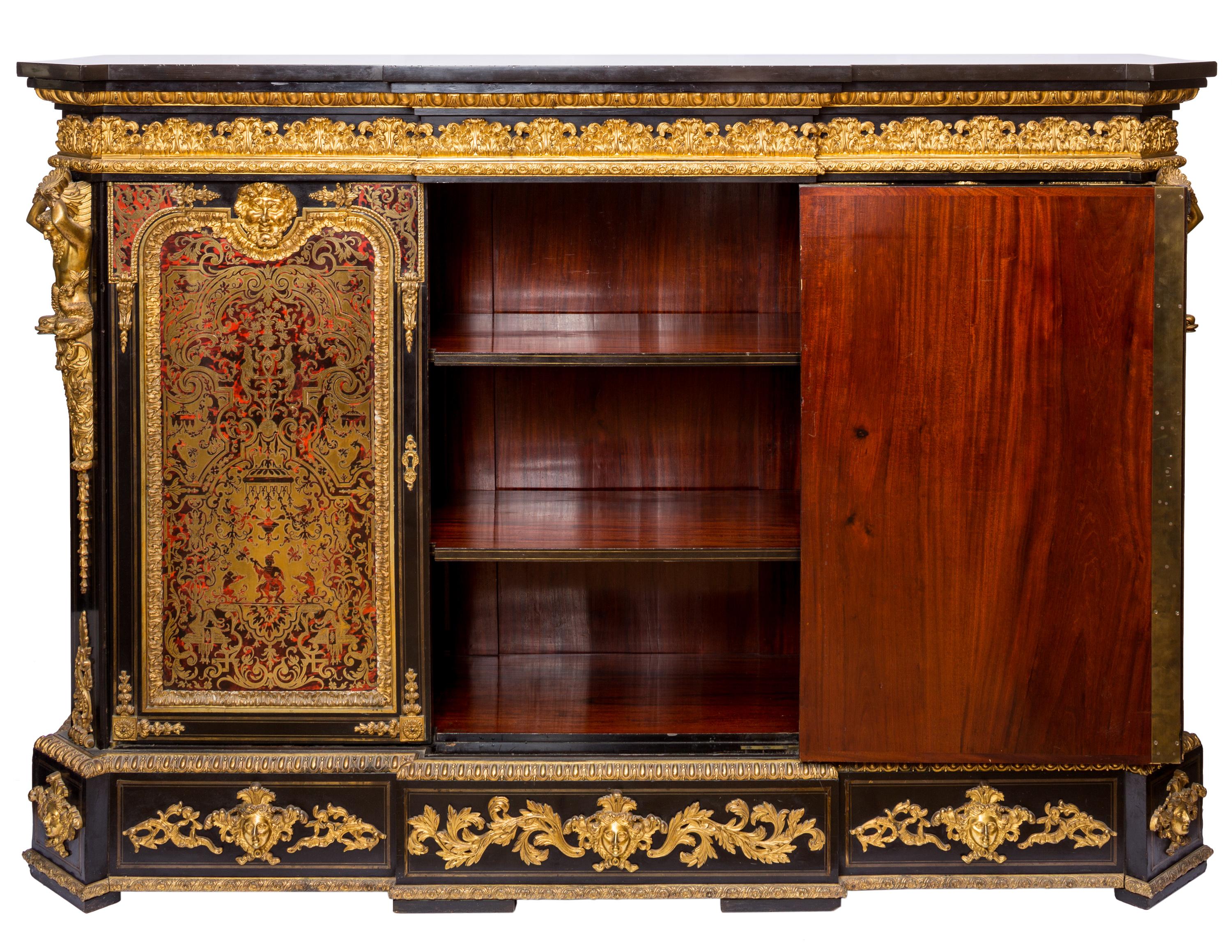 An opulent 19th century French Napoleon III (nephew of Bonaparte I) style commode, with Boulle style red-orange tortoiseshell and brass marquetry, ormolu detailing and marble top. The front features three highly decorative doors with panels of