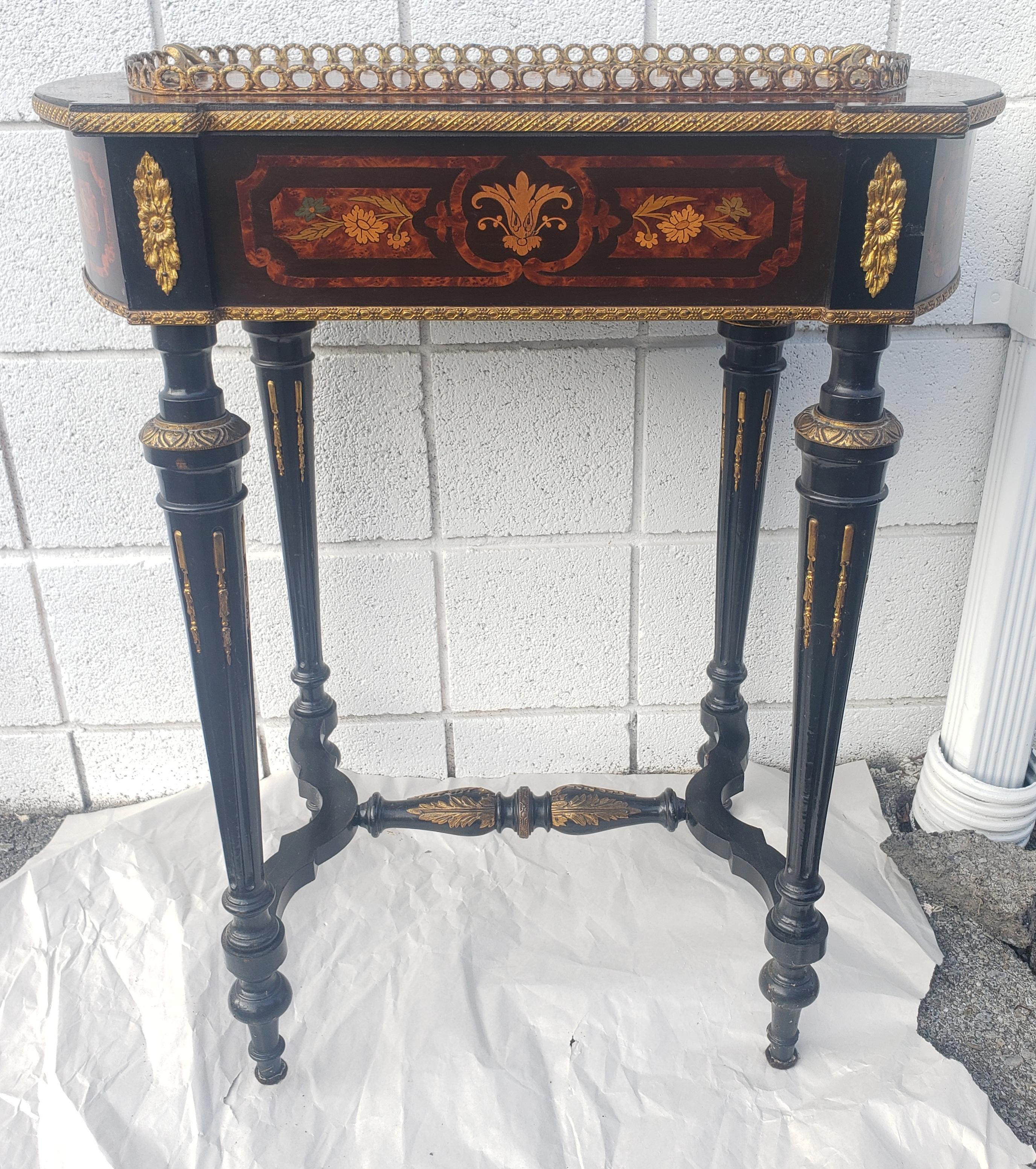 A late 19th century Napoleon III Brass Marquetry Boulle Inlay and Ebonized Wood Planter Table. Exceptional craftsmanship. Beautifully decorated. Measures 25