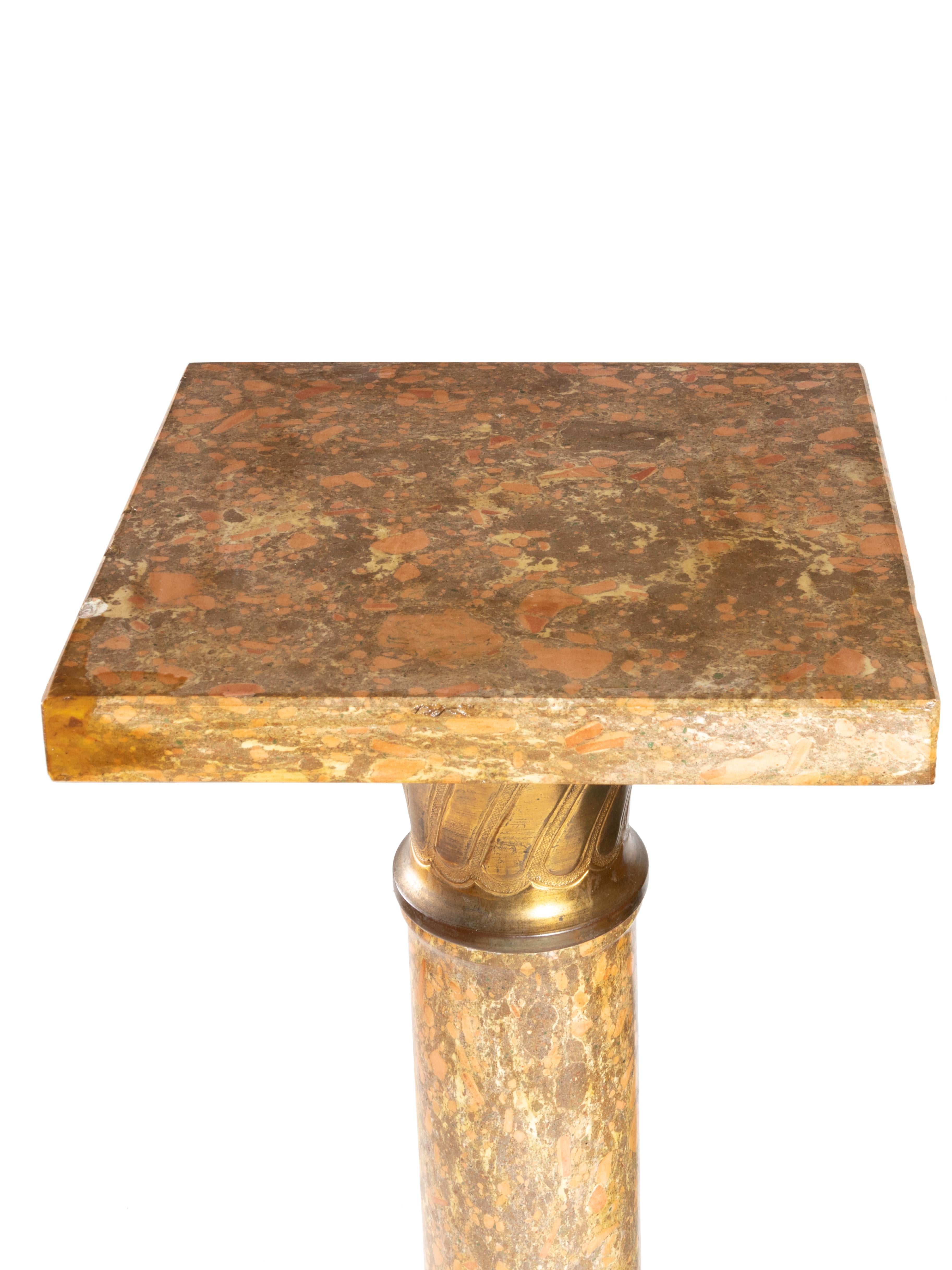 A Napoleon III Brocatelle Marble Ornamental Pedestal Column from the 19th Century, 

A brocatelle Jaune marble, set on a square and terraced base with gilted bronze details in Napoleon III style and period.

Take into account that the colors on the