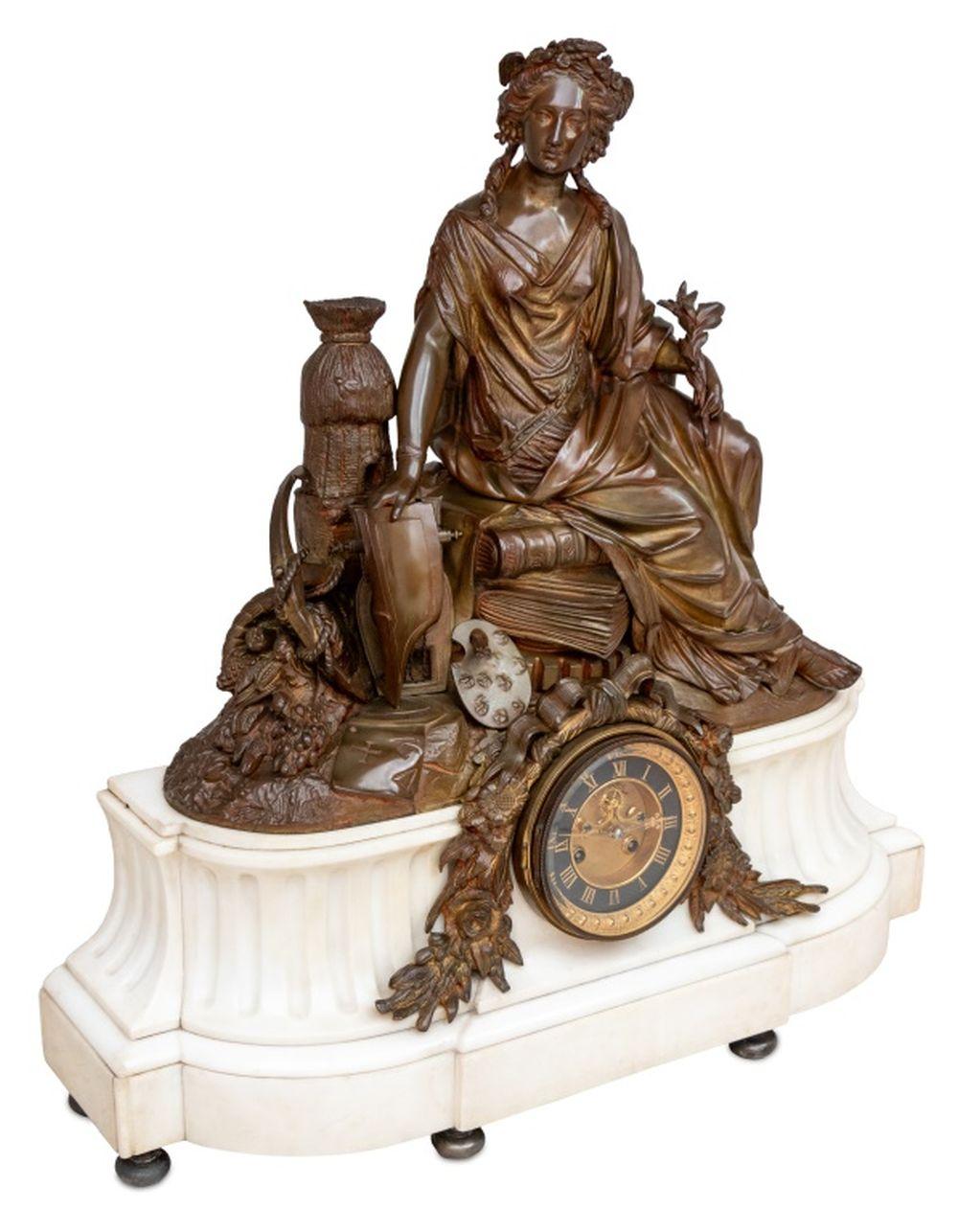 Napoleon III Patinated Bronze and White Marble Figural Clock, circa 1870, the seated figure illustrative of the Arts, surmounting a fluted breakfront white marble base, centered by a circular dial with open escapement, the movement striking on bell,