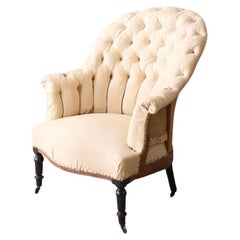 Used Napoleon III buttoned curved back armchair