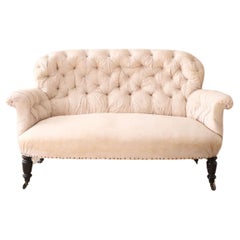Napoleon III buttoned curved back sofa