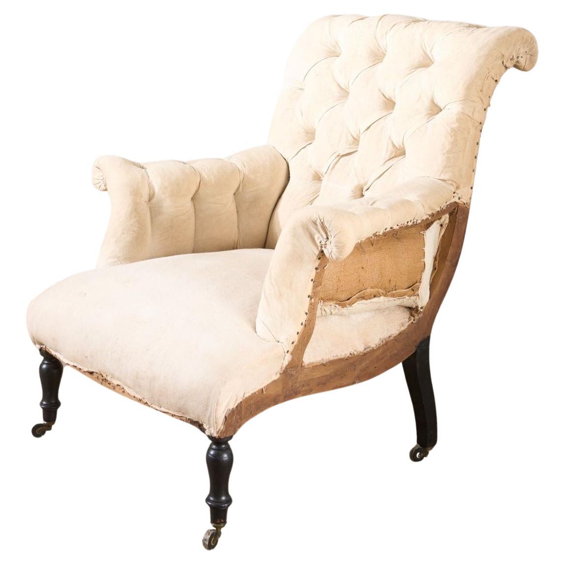 Poltrona Napoleone III con schienale a voluta abbottonato