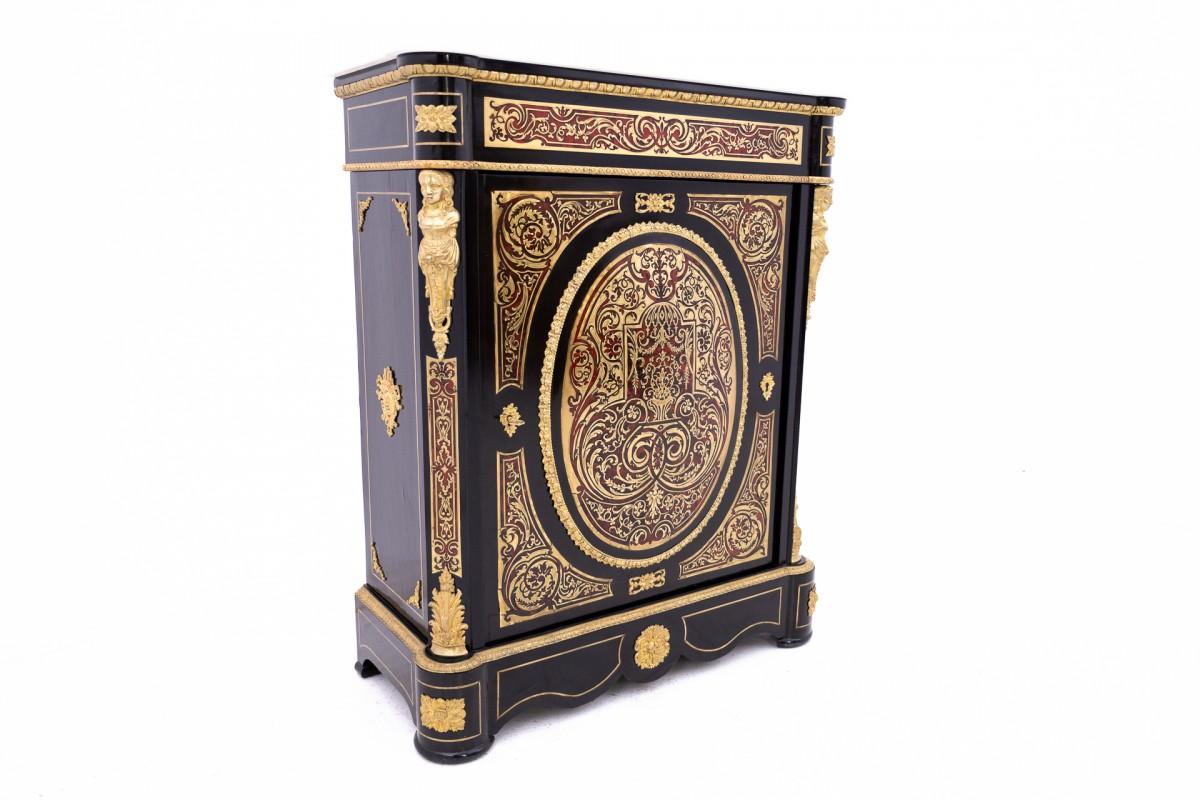 We present a unique, antique Boulle style chest of drawers from the mid-19th century in France. This unique chest of drawers is not only a great example of masterful craftsmanship, but also a valuable collector's item that will add a touch of