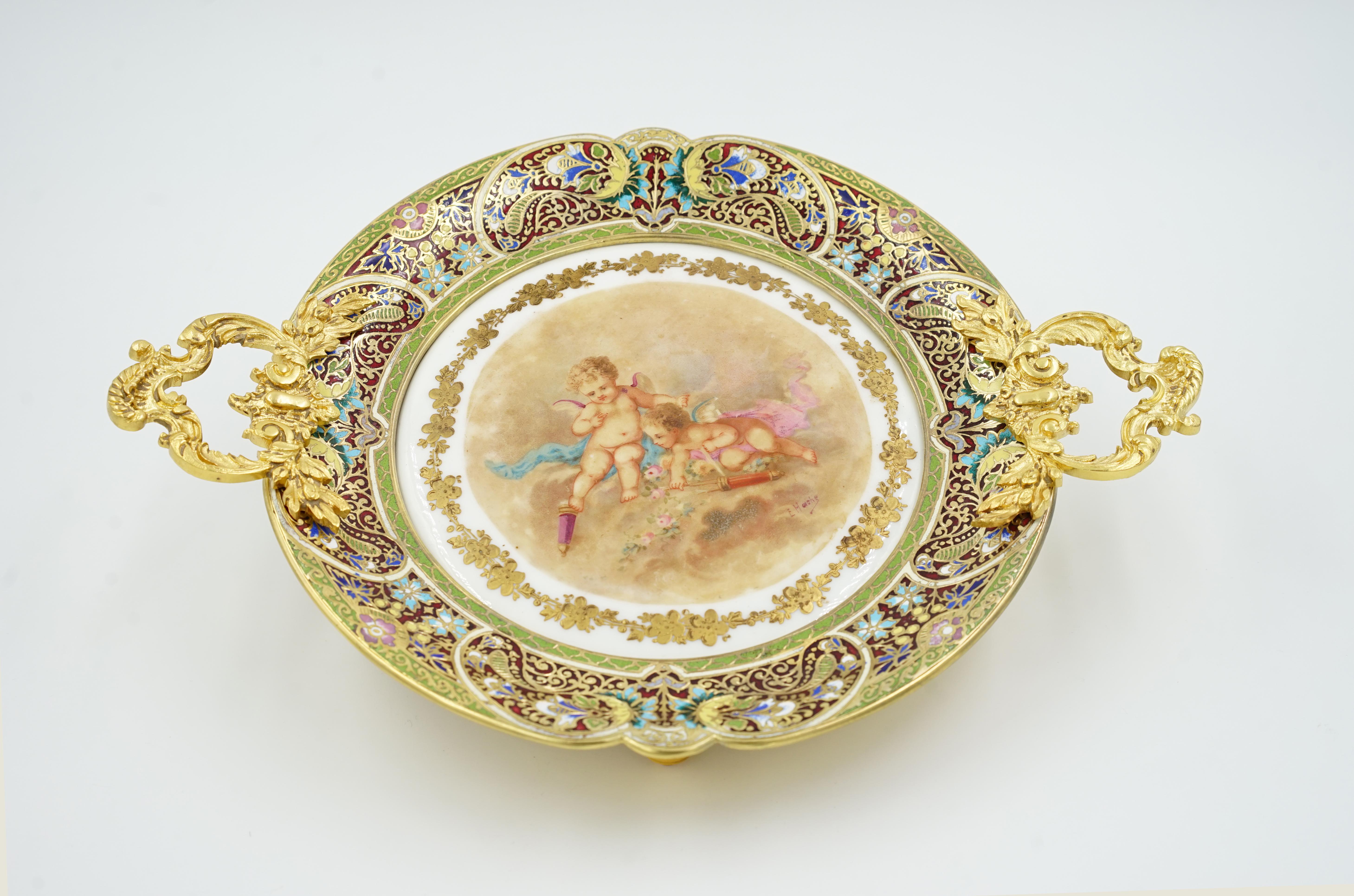 Napoleon III card holder
(card fray)
Gilt bronze and enamel
Origin France Circa 1900
Gilt bronze and Cloissone enamel with hand-painted Sevres porcelain plate signed by E. Horche
Perfect condition
Napoleon IIII style
The Second Empire style (from