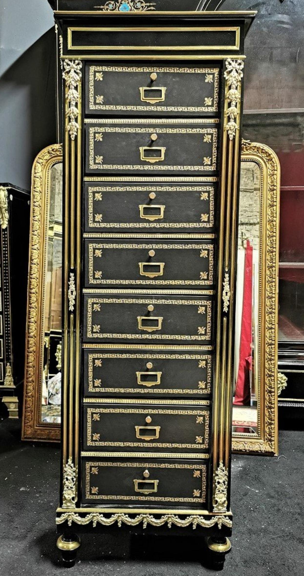 Rare Napoleon III cardboard box cabinet with for documents, with rich ornamentation of gilded bronzes, falls, ingot molds, angles and masks on the sides. Eight big boxes (superior in A4 format) with redone facades, with small iron gilding, and