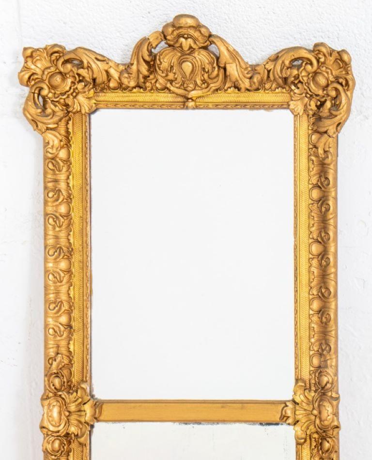 Napoleon III carved giltwood mirror with floral patterns, circa nineteenth century. 
