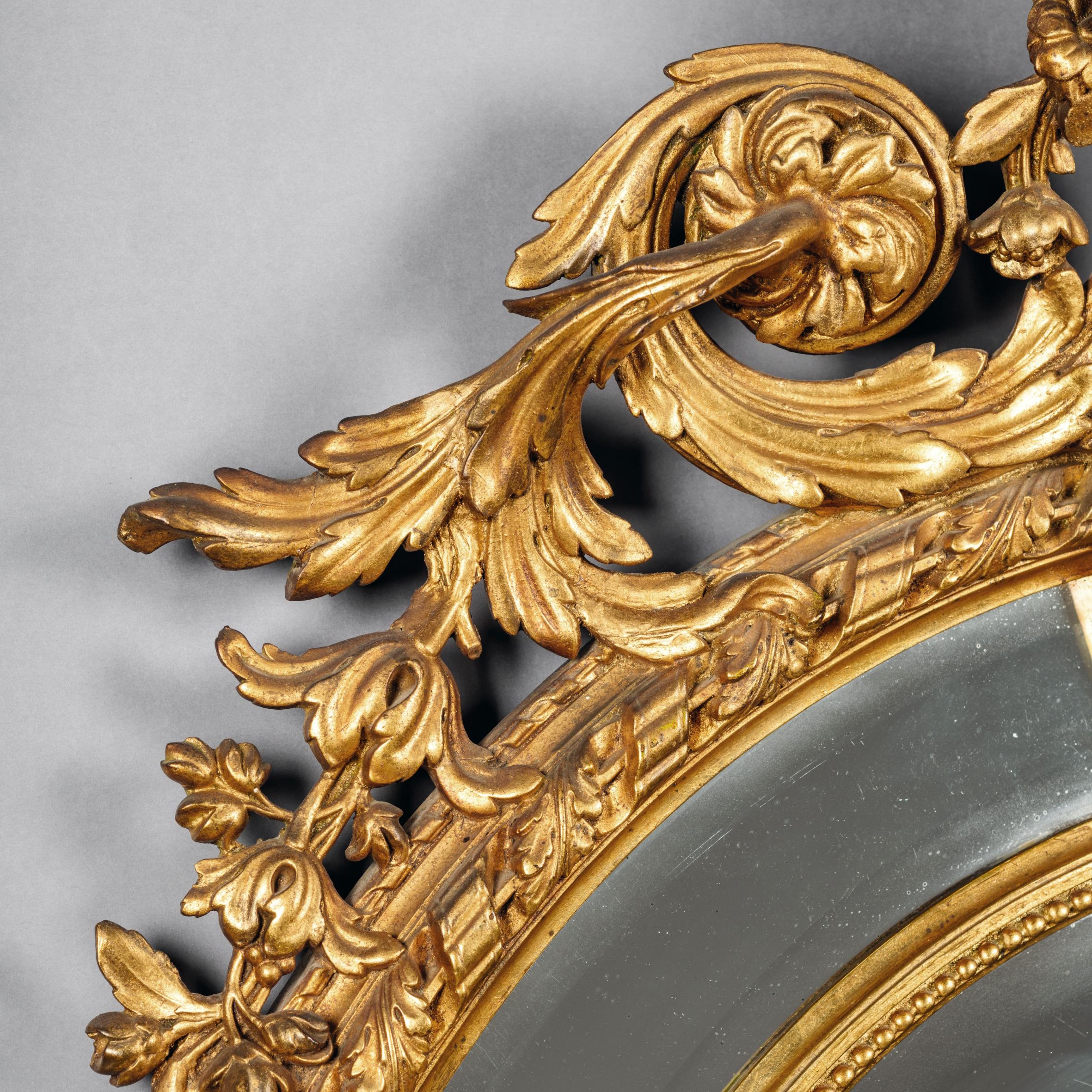 Napoleon III Carved Giltwood Oval Marginal Frame Mirror In Good Condition For Sale In Brighton, West Sussex