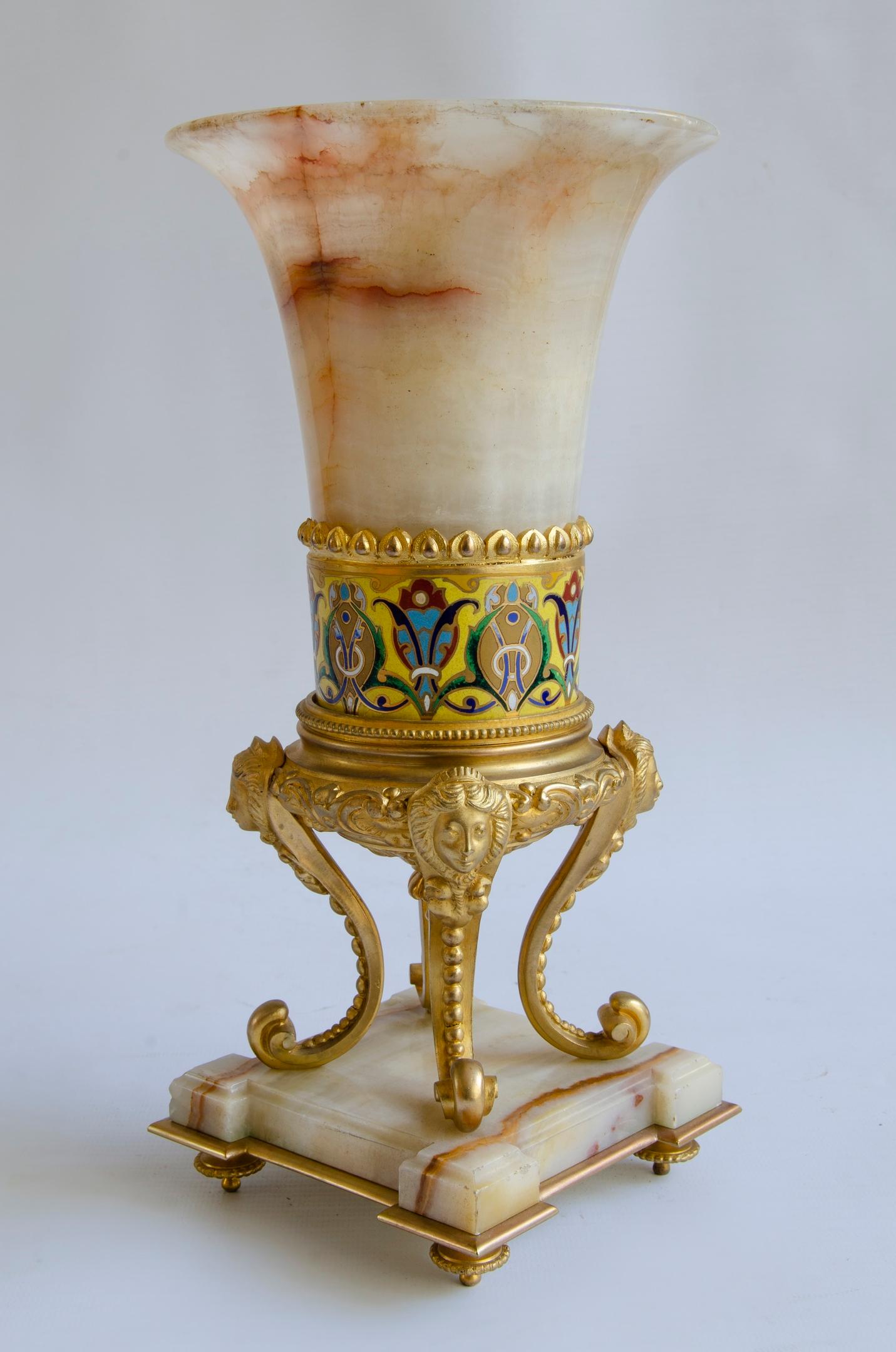 Napoleon III centerpiece
circa 1900 Origin France
Onyx, gilt bronze and chamnpleve enamel
perfect condition.
The Napoleon III style had its heyday during the 1850s and 1880s. Emperor Napoleon wanted to emulate the lavishness and elegance of the
