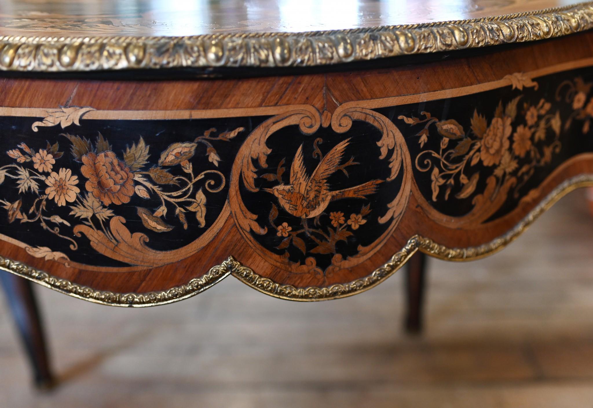 You are viewing an elegant French Napoleon III centre table
We date this to circa 1850 and the violin form to the shaped design is gorgeous
Ormolu fixtures are original and include female maiden leg mounts
Of course the main visual draw to this