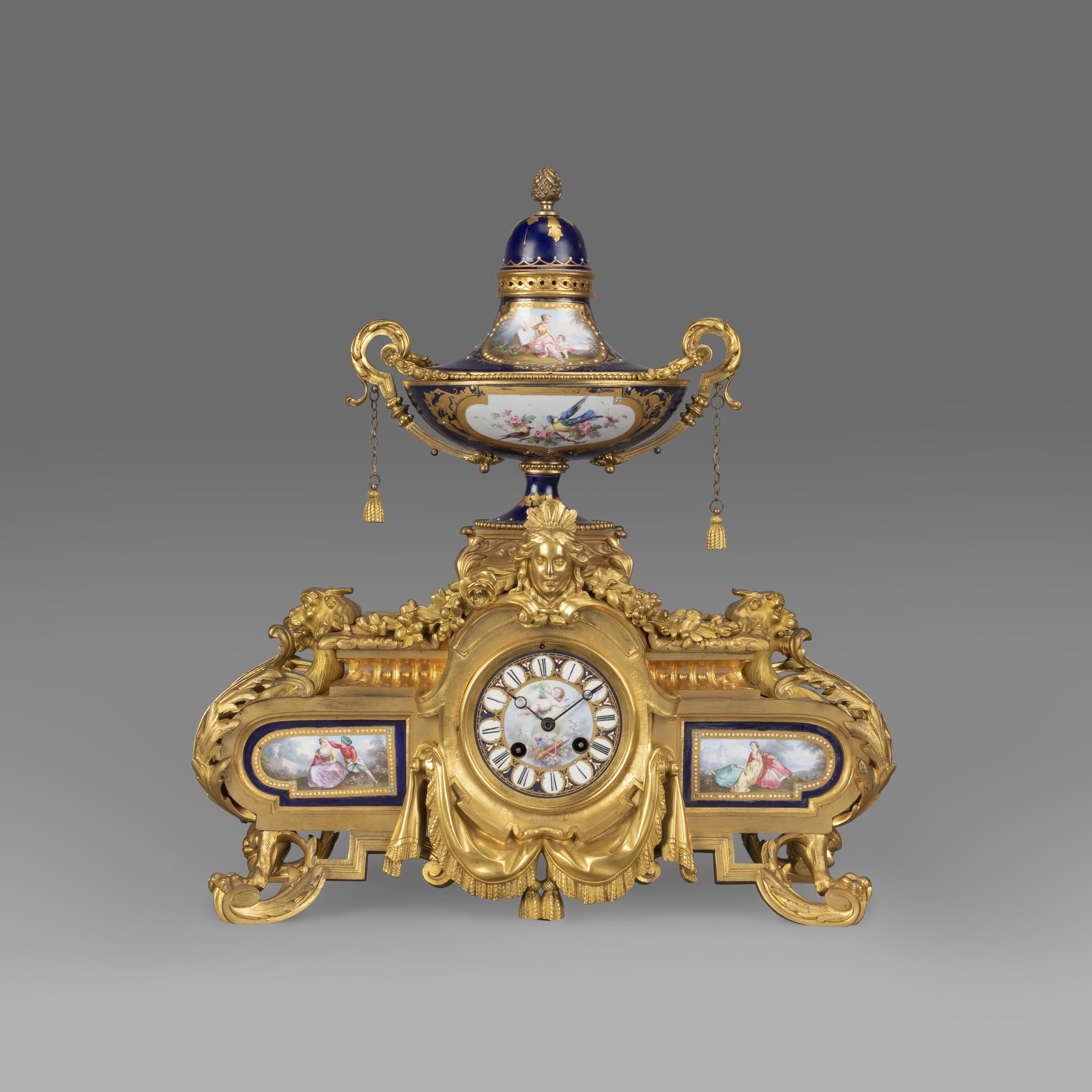 A fine Napoleon III gilt-bronze and porcelain mounted clock garniture, designed by Louis-Constant Sévin, cast by Ferdinand Barbedienne, The Movement by Japy Frères.

Frédéric Japy (1749-1812) was apprenticed in Montbeliard to his clockmaker uncle,