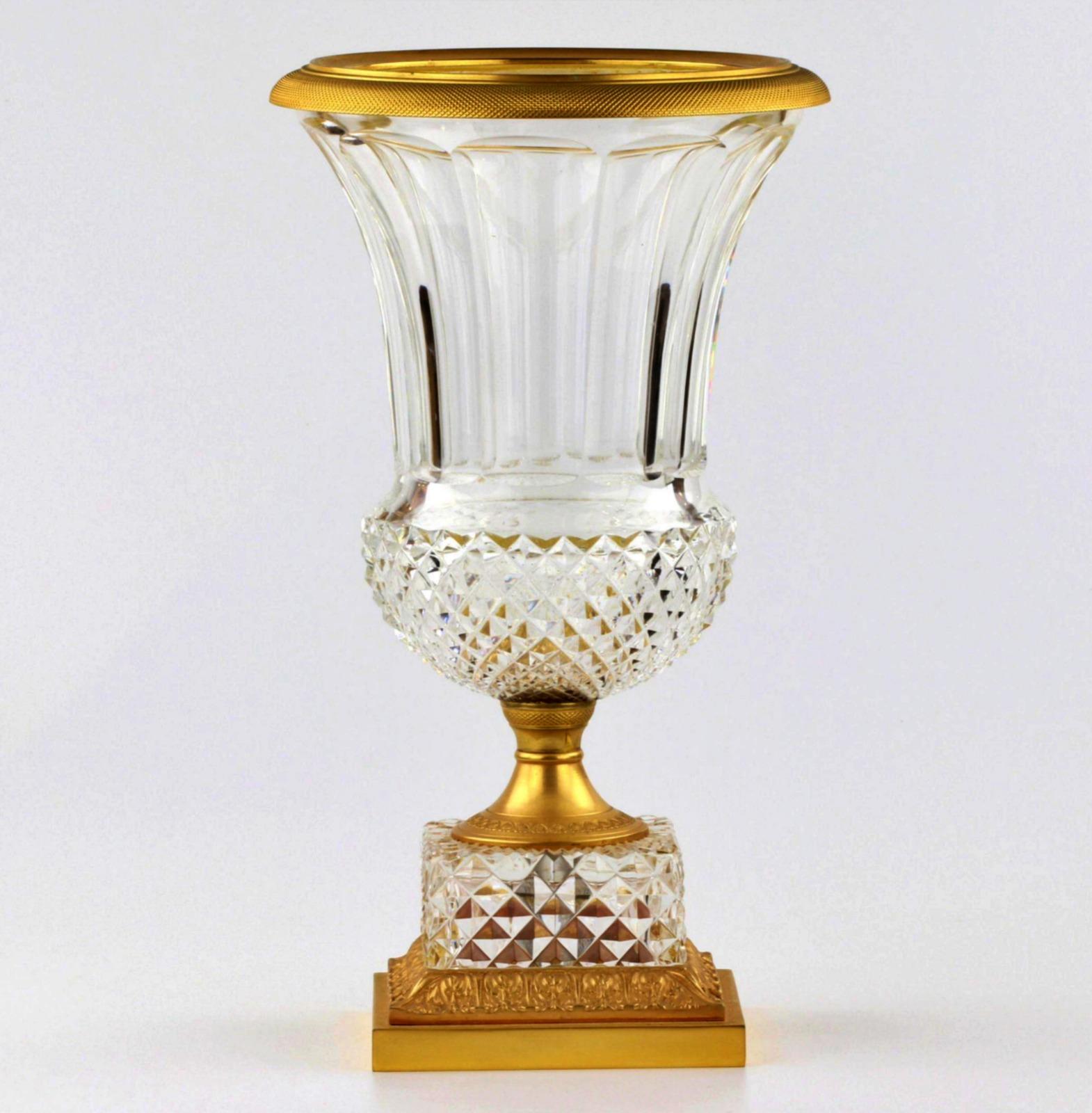Napoleon III Crystal Vase - Empire - France 19th century
with gilt bronze and diamond padding on the bases.
Classic proportions and design.
H-35cm. Width: 20cm, Height: 35cm, Depth: 20cm, Weight: 3kg, Condition: Good, Material: Glass, gilded