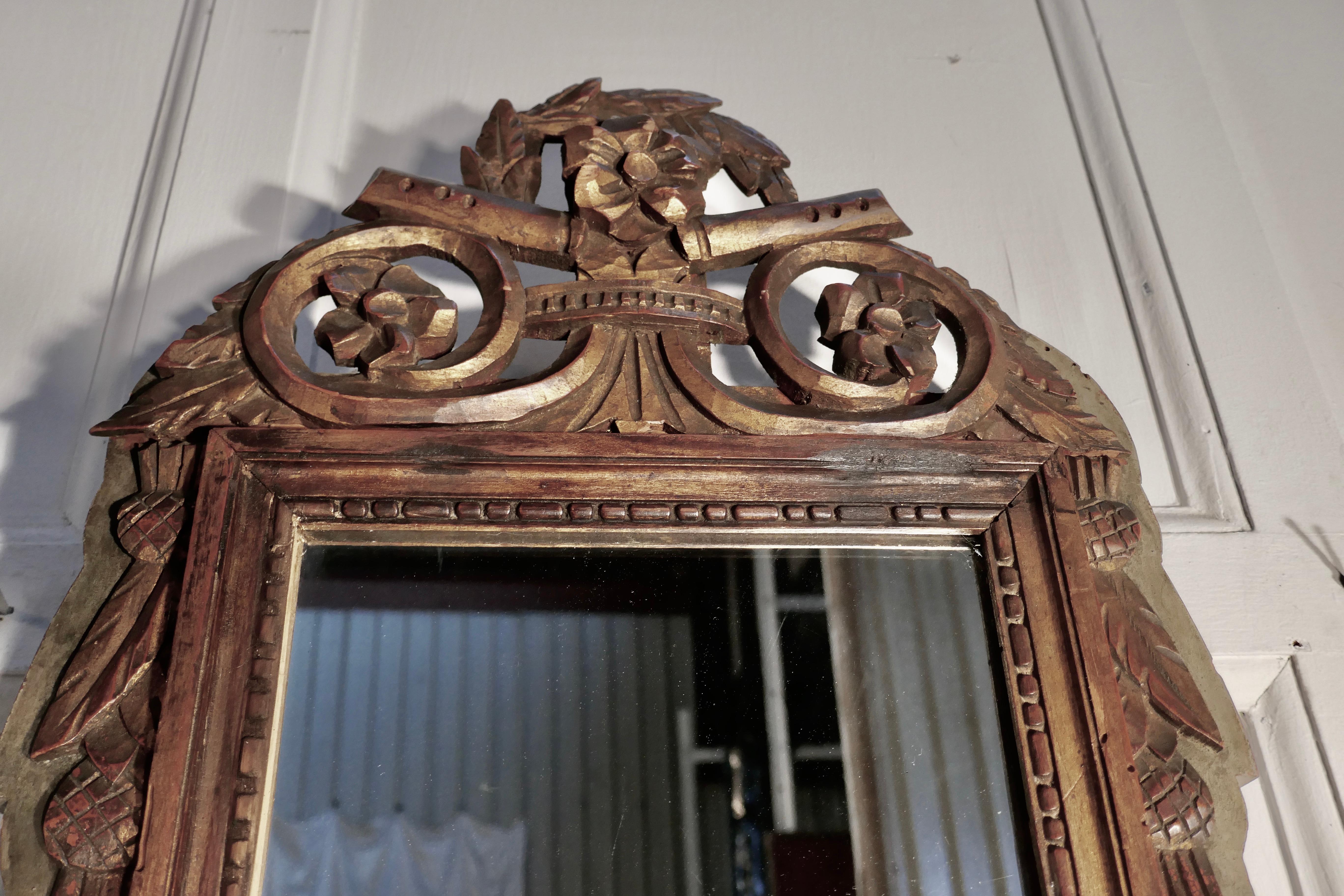 Napoleon III, distressed, faded long wall mirror

This is a very old and beautifully worn piece, the frame has lost a little of its lustre now but the gold and coloured finish is still very attractive and have not been refinished and it comes with