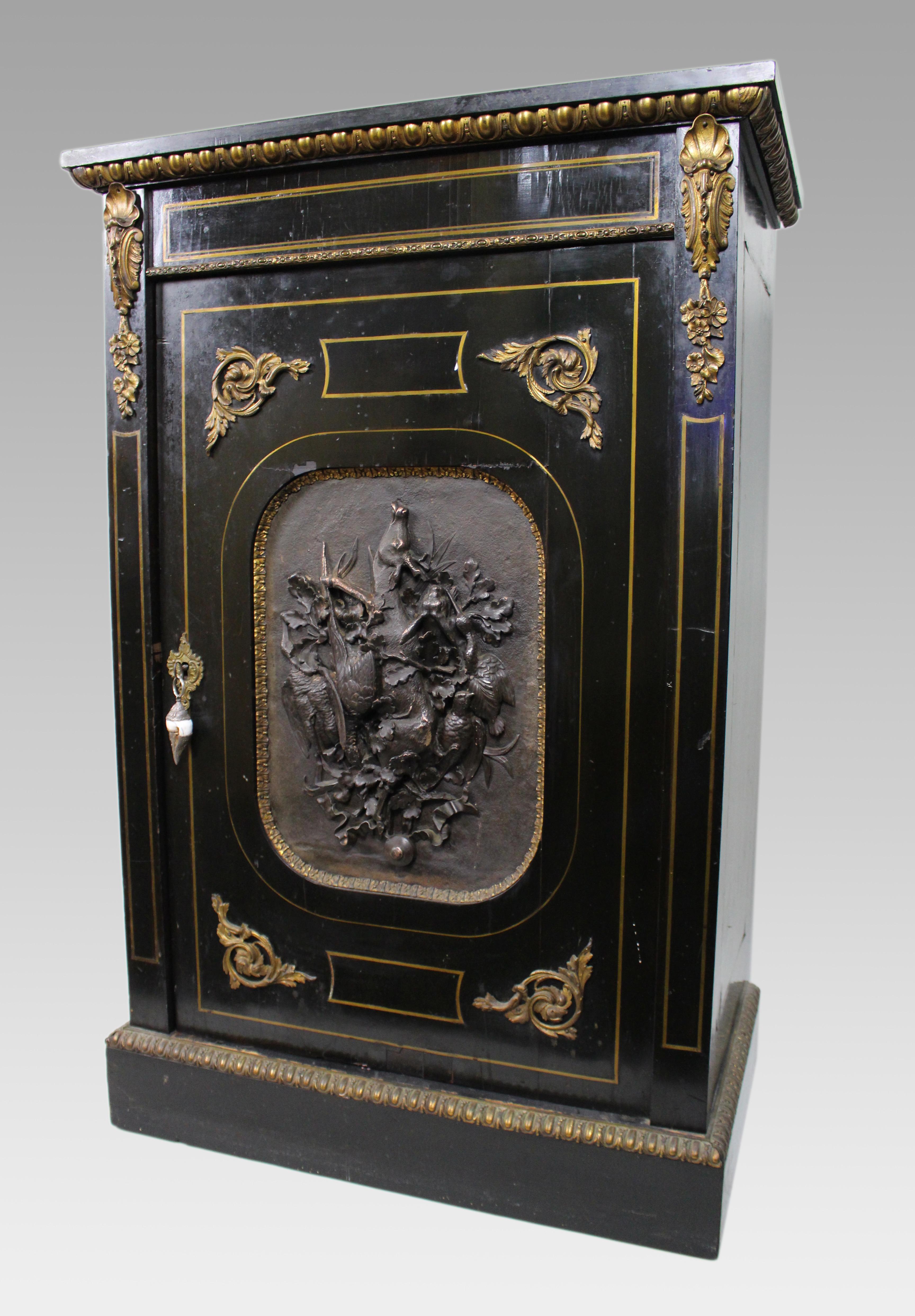 Napoleon III Ebonised Pier Cabinet with Electrotype Panel – French, c.1865

A decorative mid-19th century French pier cabinet in the Napoleon III style, dating to circa 1865. Ebonised wood throughout with brass stringing and gilt metal mounts, and a