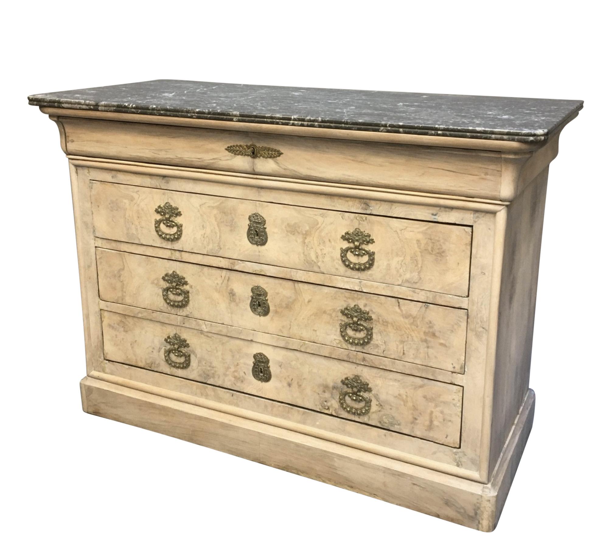 A French Napoleon III, Empire Revival four drawer commode in pickled mahogany. With good bronze handles and variegated grey marble top.