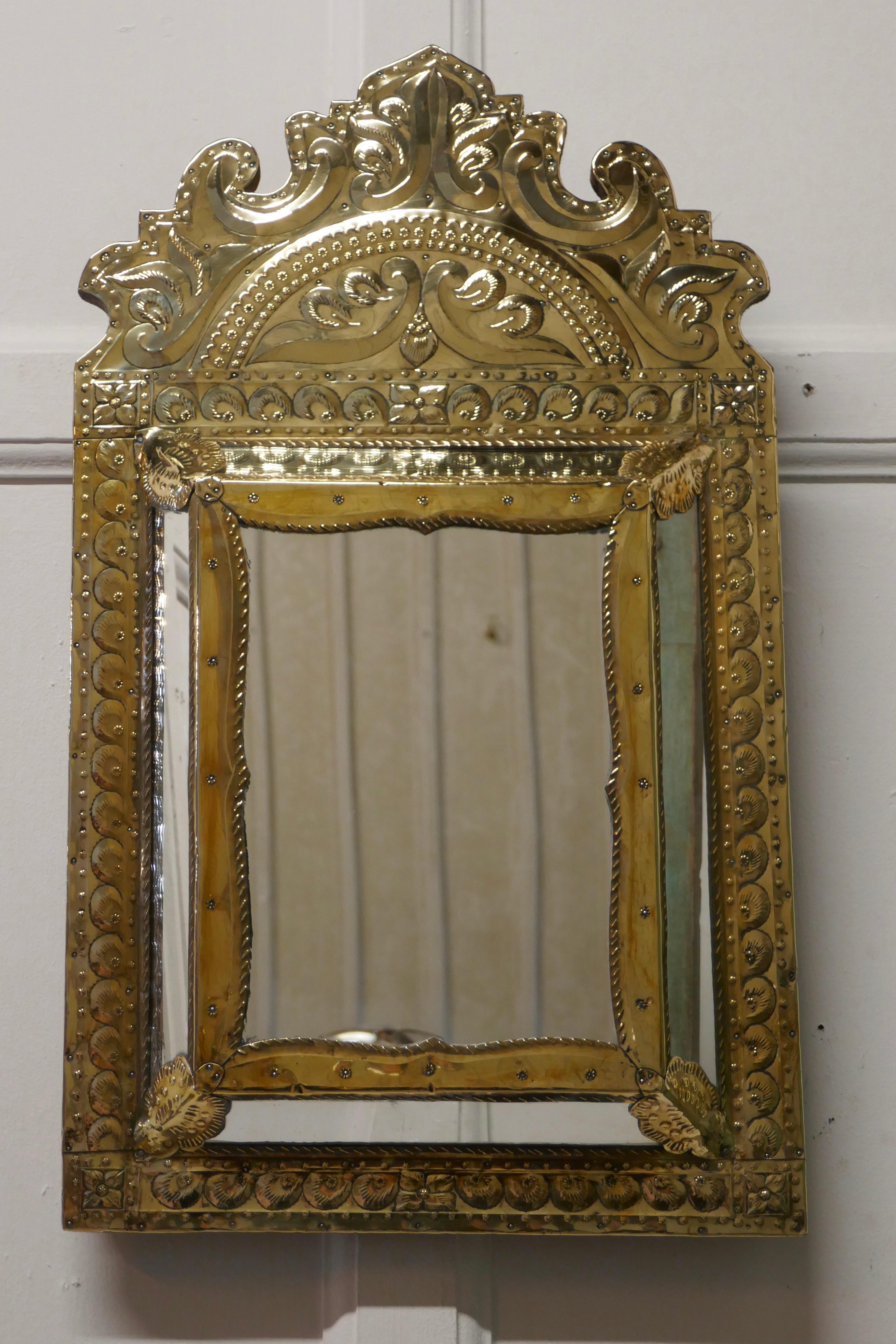 Napoleon III French brass cushion mirror

The hand beaten brass frame has a North African style of decoration, both the mirror and frame are in good condition
The mirrors are all original, the mirror has solid wooden back
The mirror frame is 3”