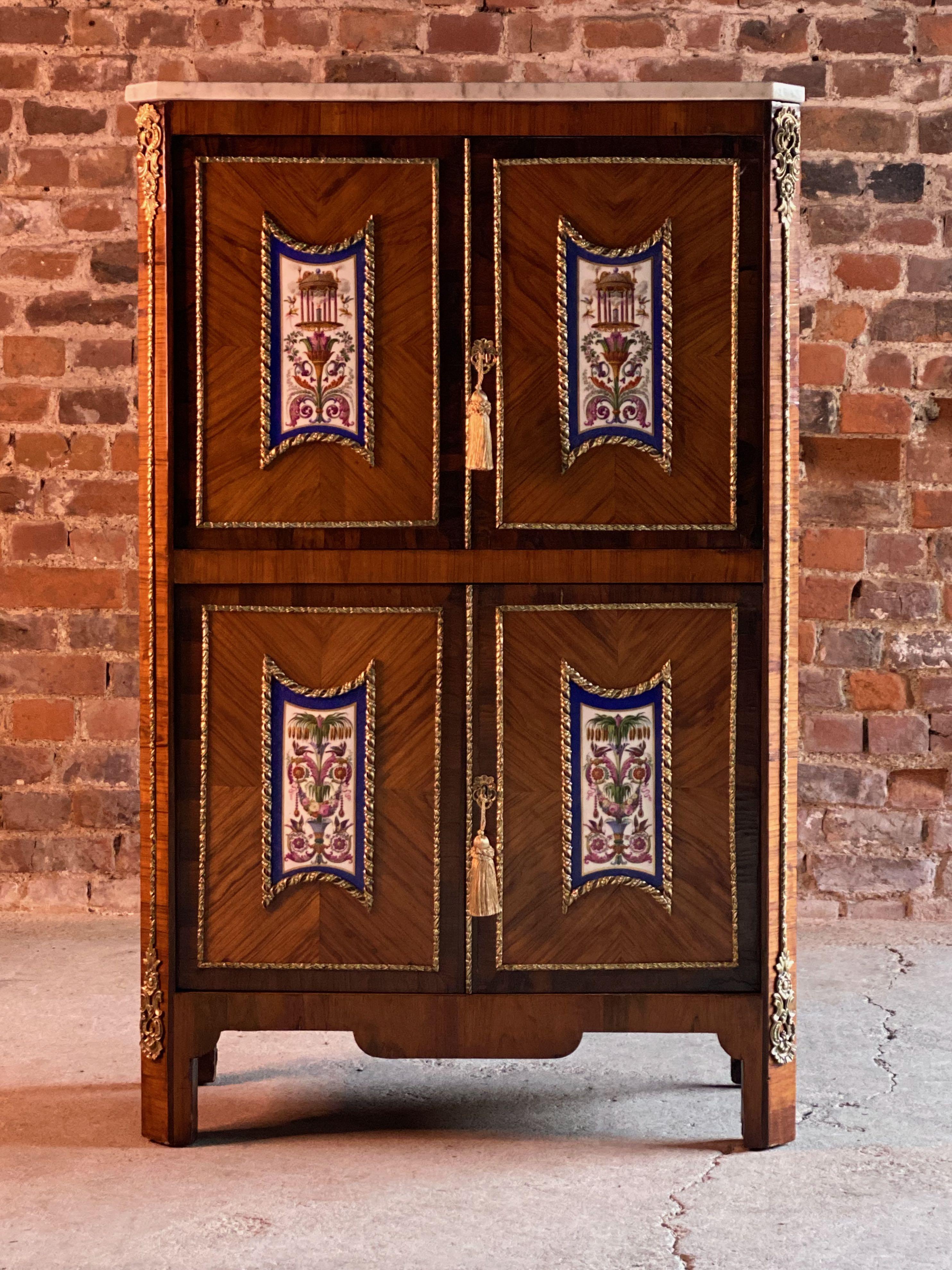 Napoleon III French Escritoire cabinet Kingwood and rosewood France 1890

We are delighted to offer a 19th century French quarter veneered kingwood and rosewood cross banded Escritoire Cabinet circa 1890, with gilt metal mounts, the white