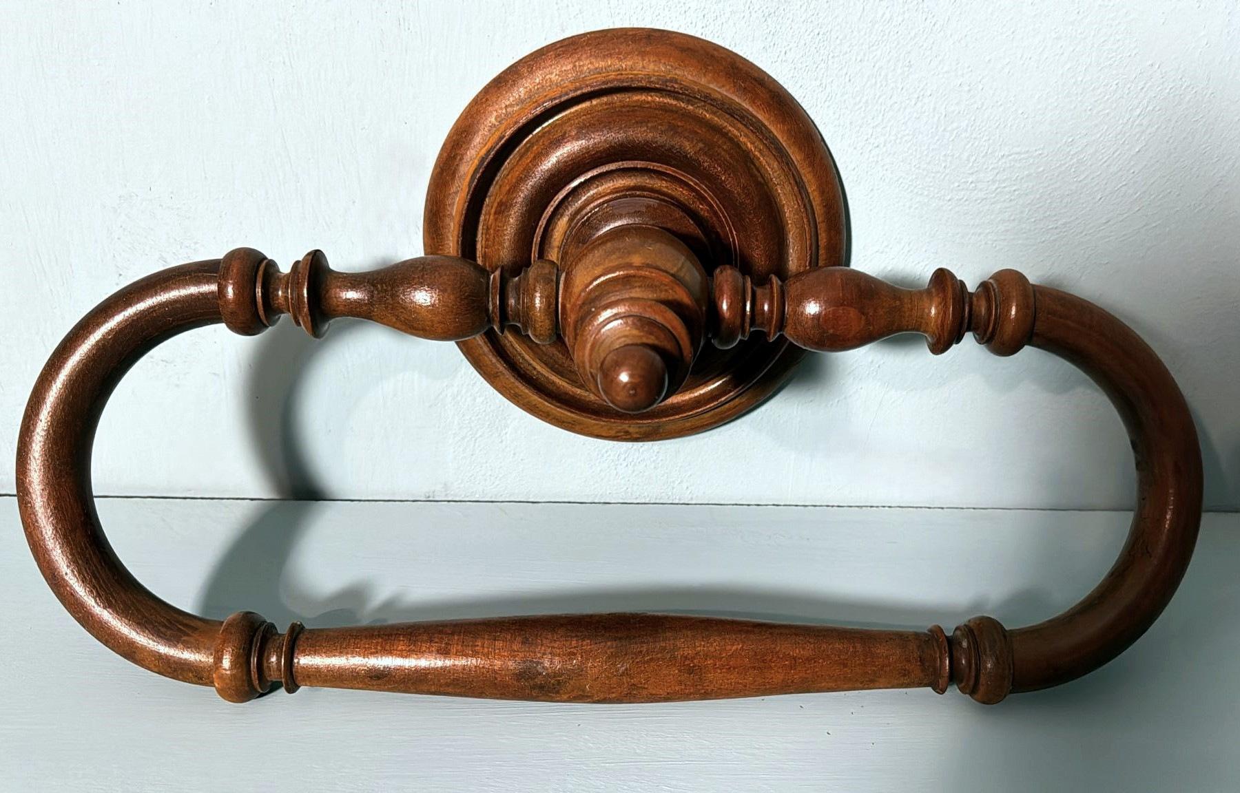 We kindly invite you to read the entire description, as we strive to provide detailed technical and historical information to ensure the authenticity of our items. This elegant and practical French walnut towel rack features a classic style inspired