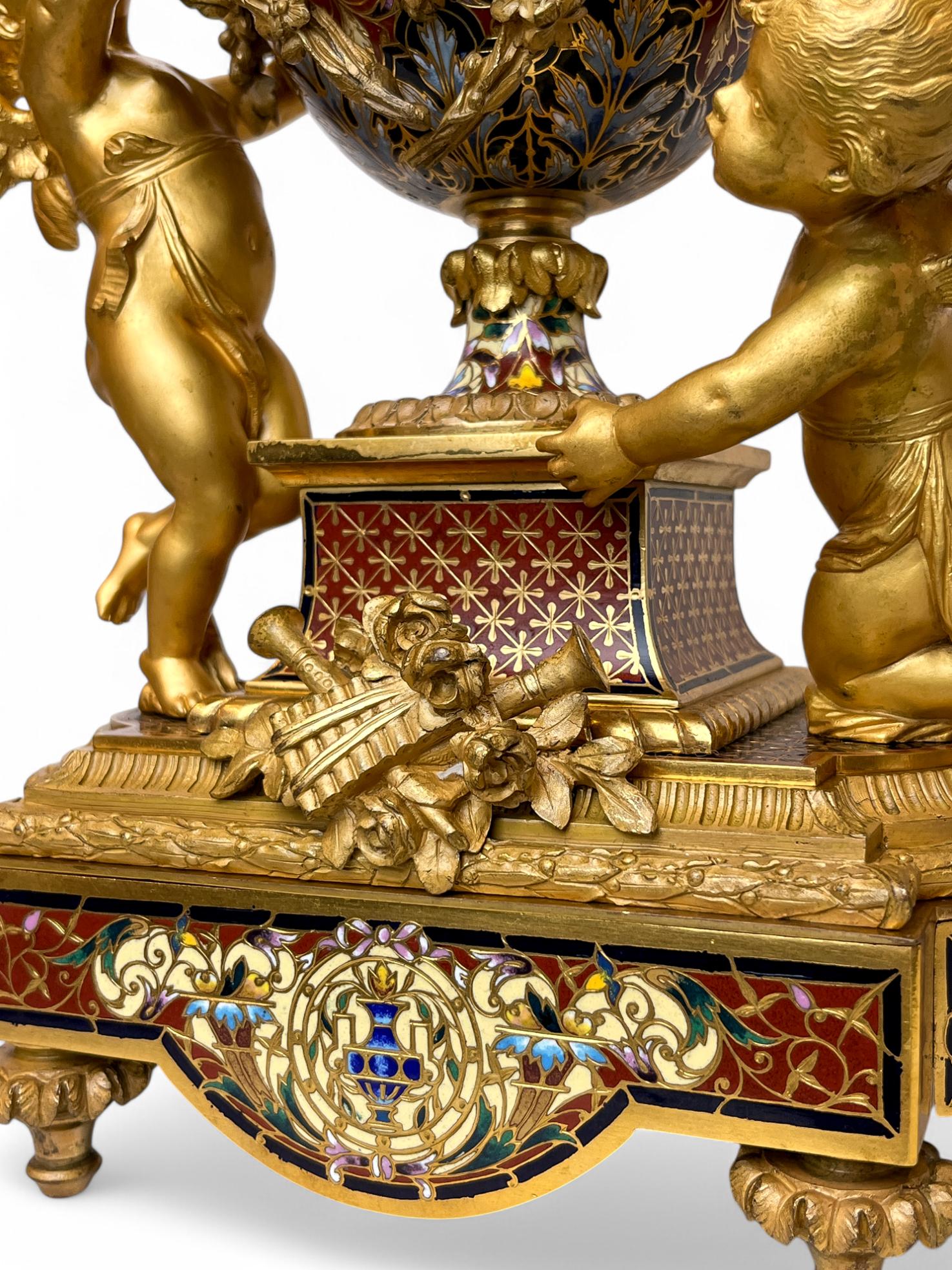 Cast Napoleon III Gilt-Bronze and Enamel Figural Mantel Clock and Candelabras For Sale