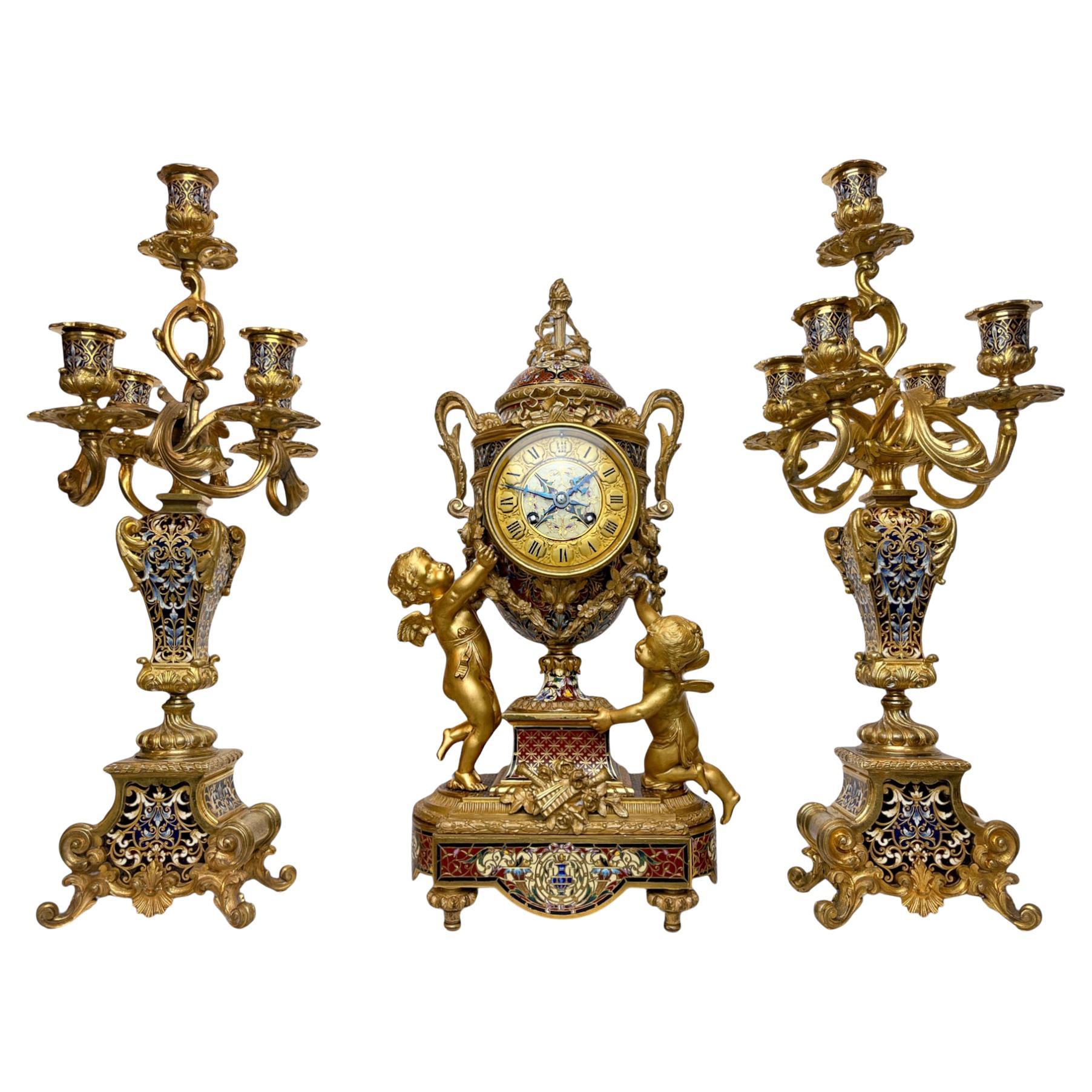 Napoleon III Gilt-Bronze and Enamel Figural Mantel Clock and Candelabras For Sale