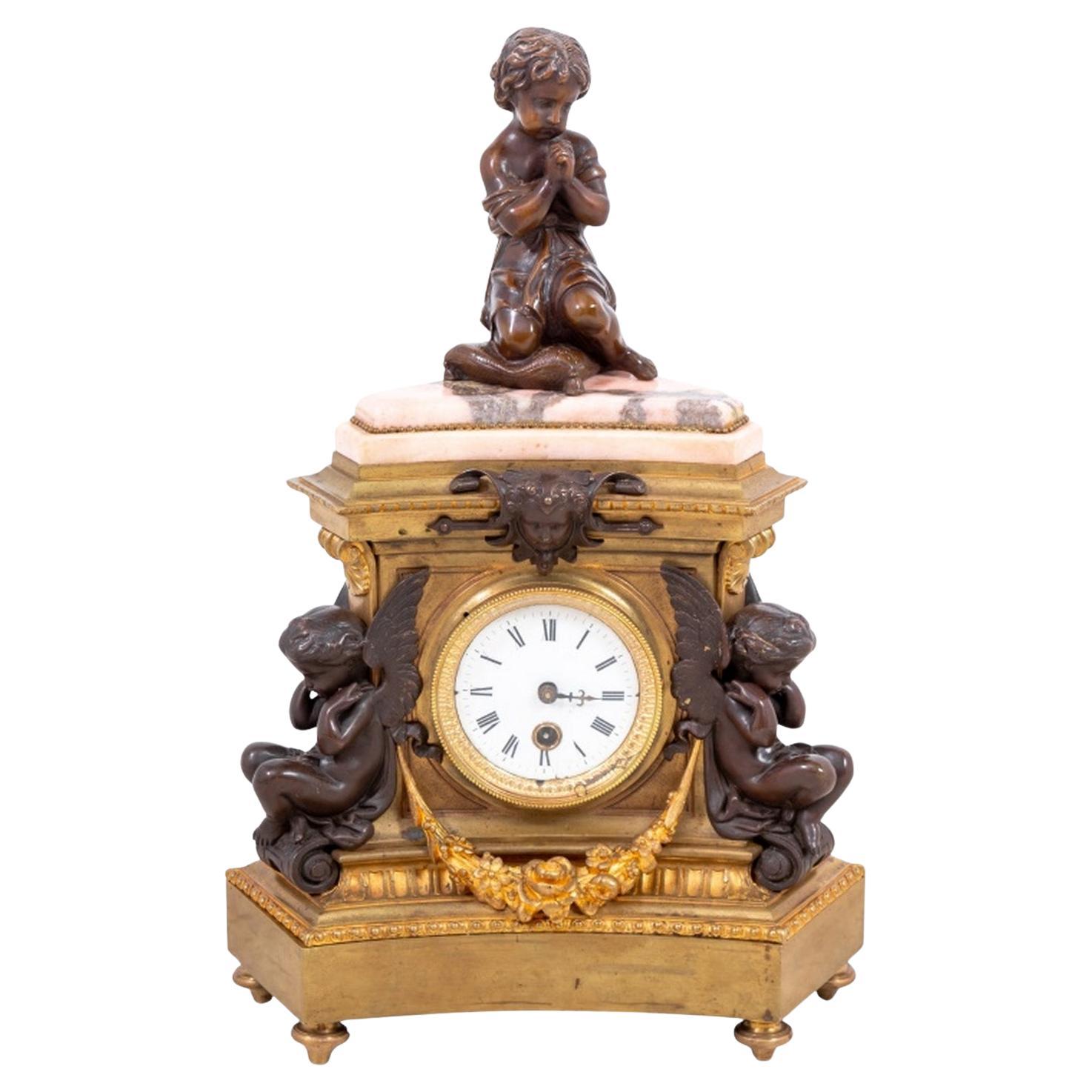 Horloge figurative Napoléon III en bronze patiné et doré