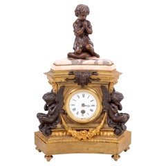 Horloge figurative Napoléon III en bronze patiné et doré
