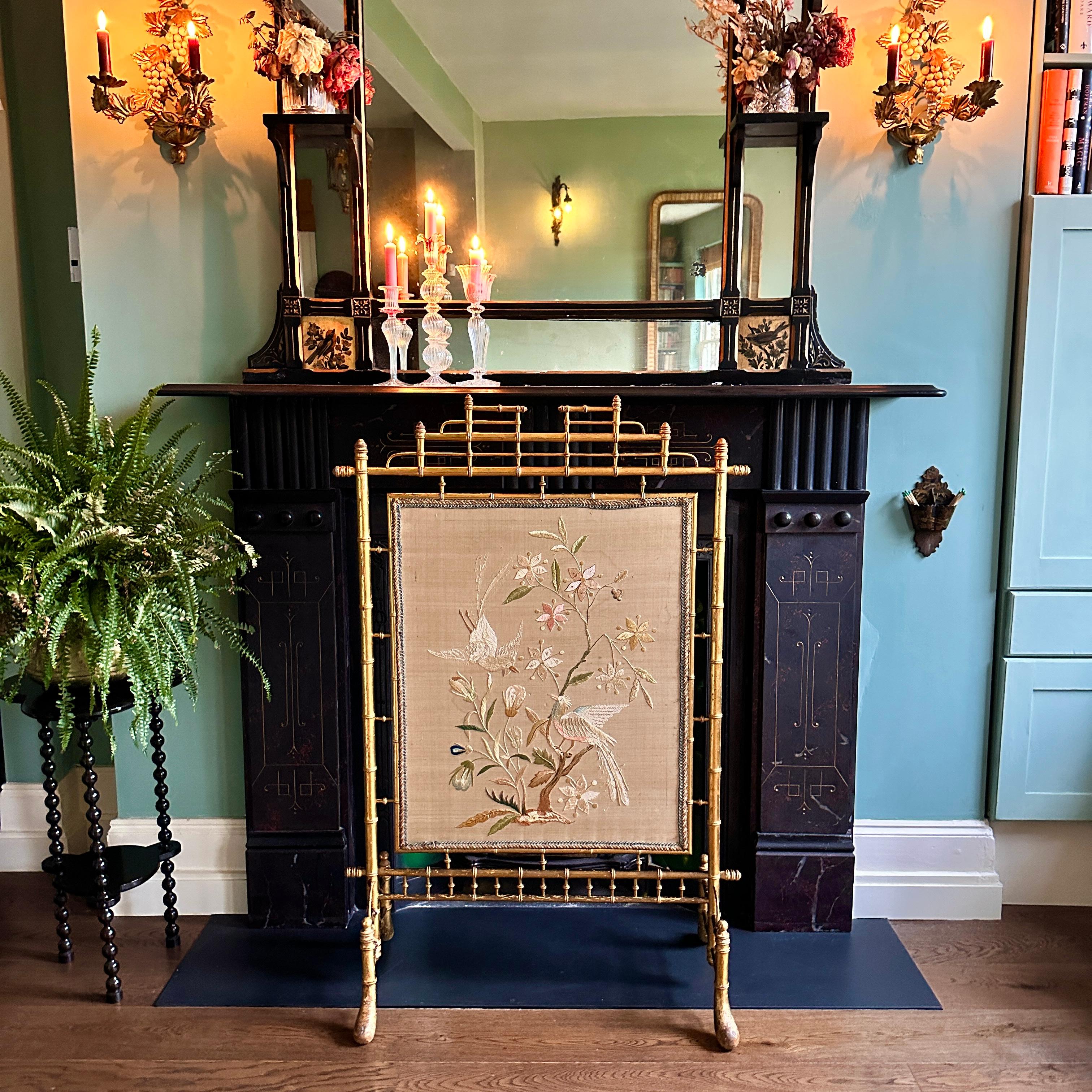 Napoleon III gilt wood & silk fire screen.

Magnificent faux bamboo and hand embroidered silk screen in the Japanese style circa 1860. In very good and sturdy original condition with light and attractive wear. A few historic and treated worm holes,