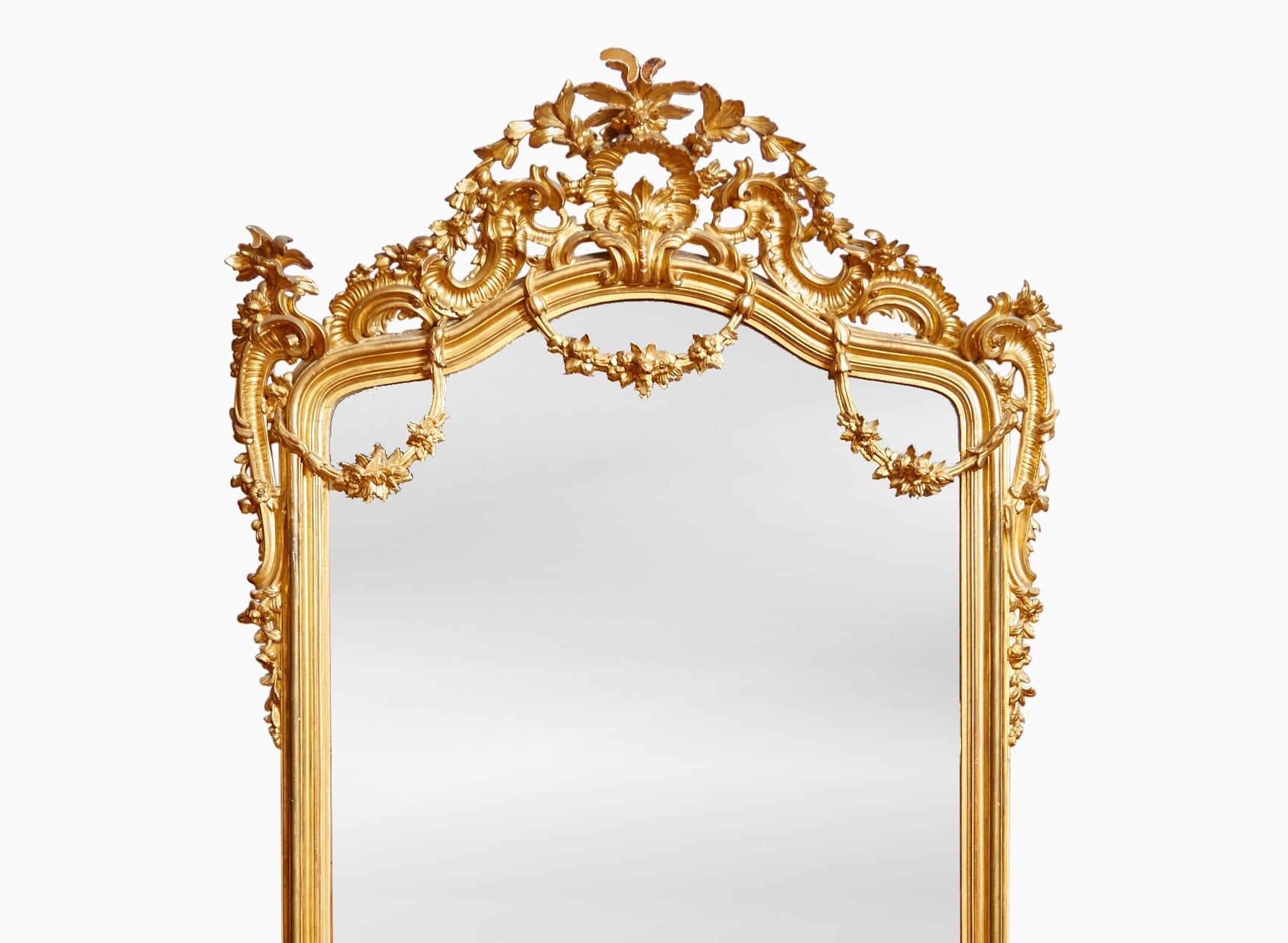 Magnificent 19th century Napoleon III giltwood pier mirror, crafted in Naples, Italy, circa 1880. This impressive mirror showcases the finest Italian craftsmanship of the period, with a beautifully hand-carved giltwood frame and an exquisitely