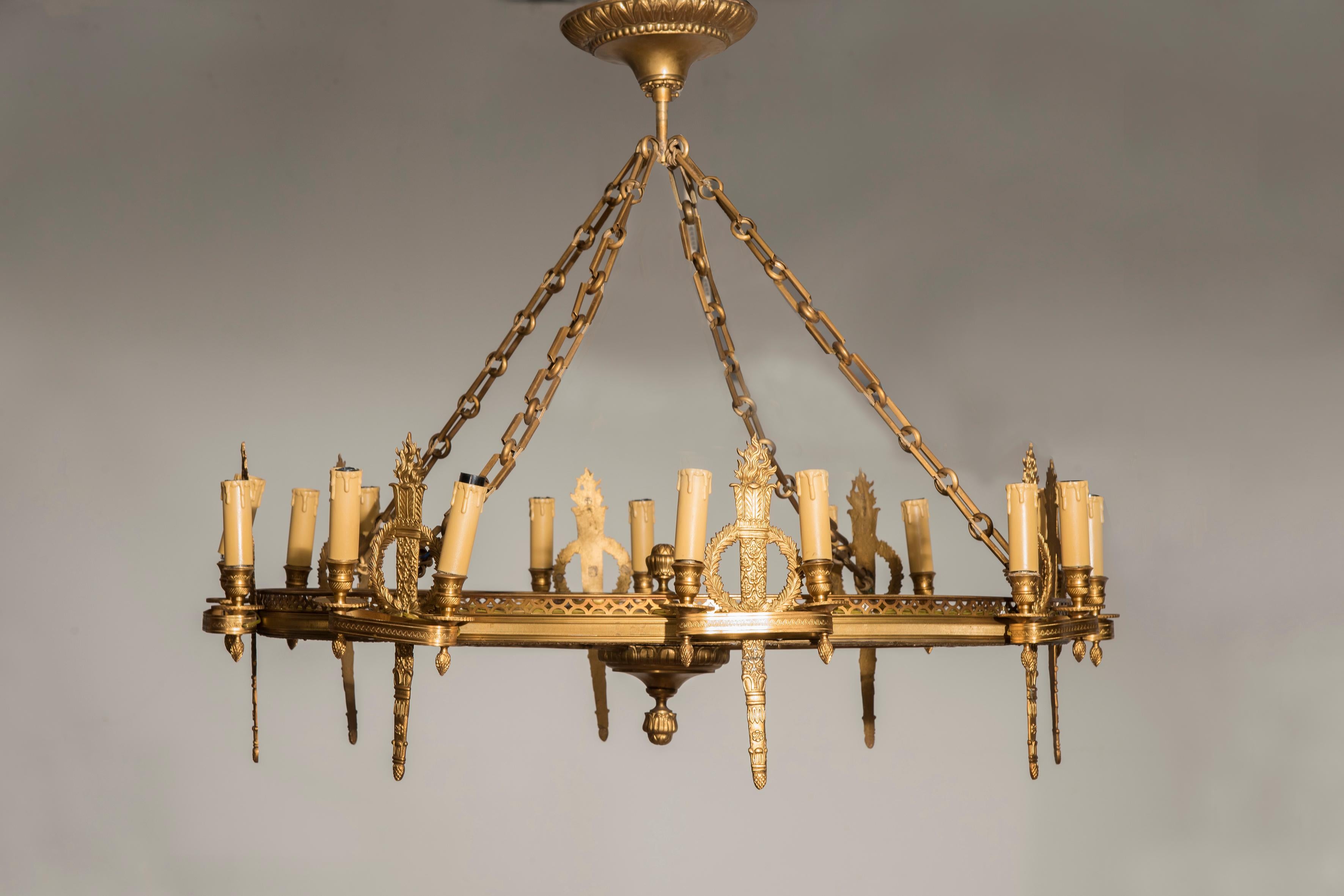 Napoleon III golden bronze eight lights rounded chandelier, from France from late 19th century in correspondence of each light holder there is quiver shaped bronze decoration. 

The chandelier is in excellent conditions. we have completely