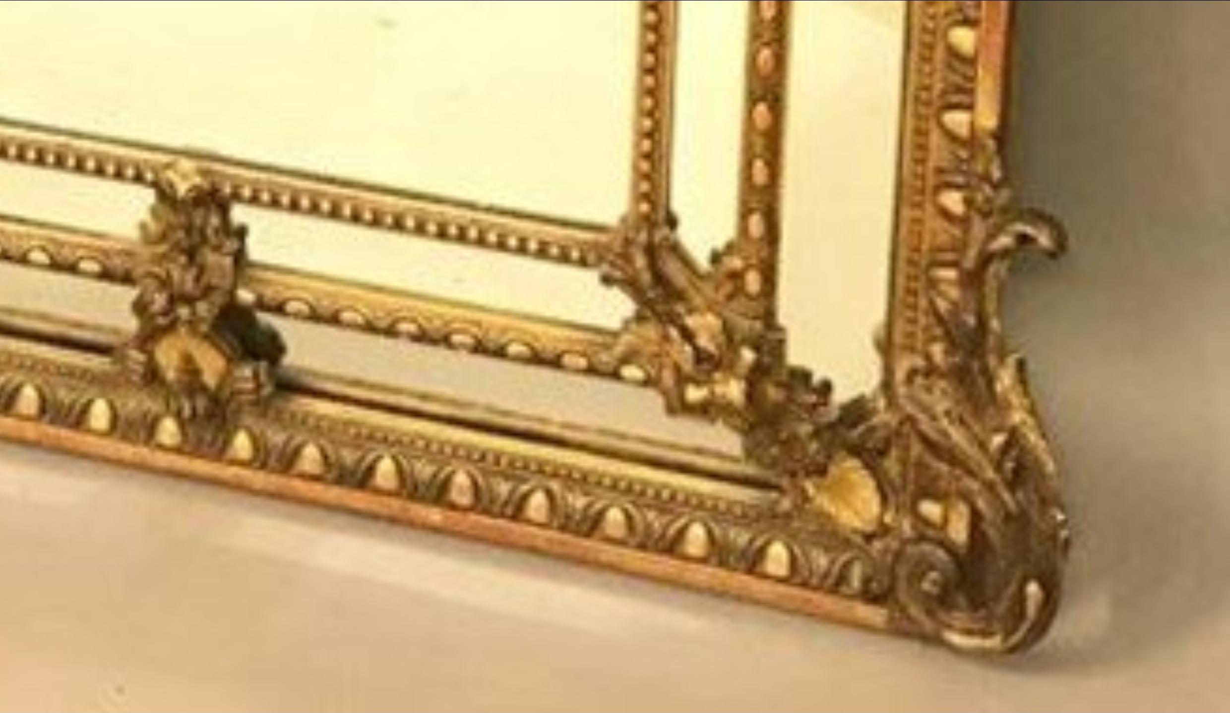 Extremely elegant Napoleon III large giltwood and stucco mirror.
France, 19th century, totally restored by our specialists, in a very good general condition.