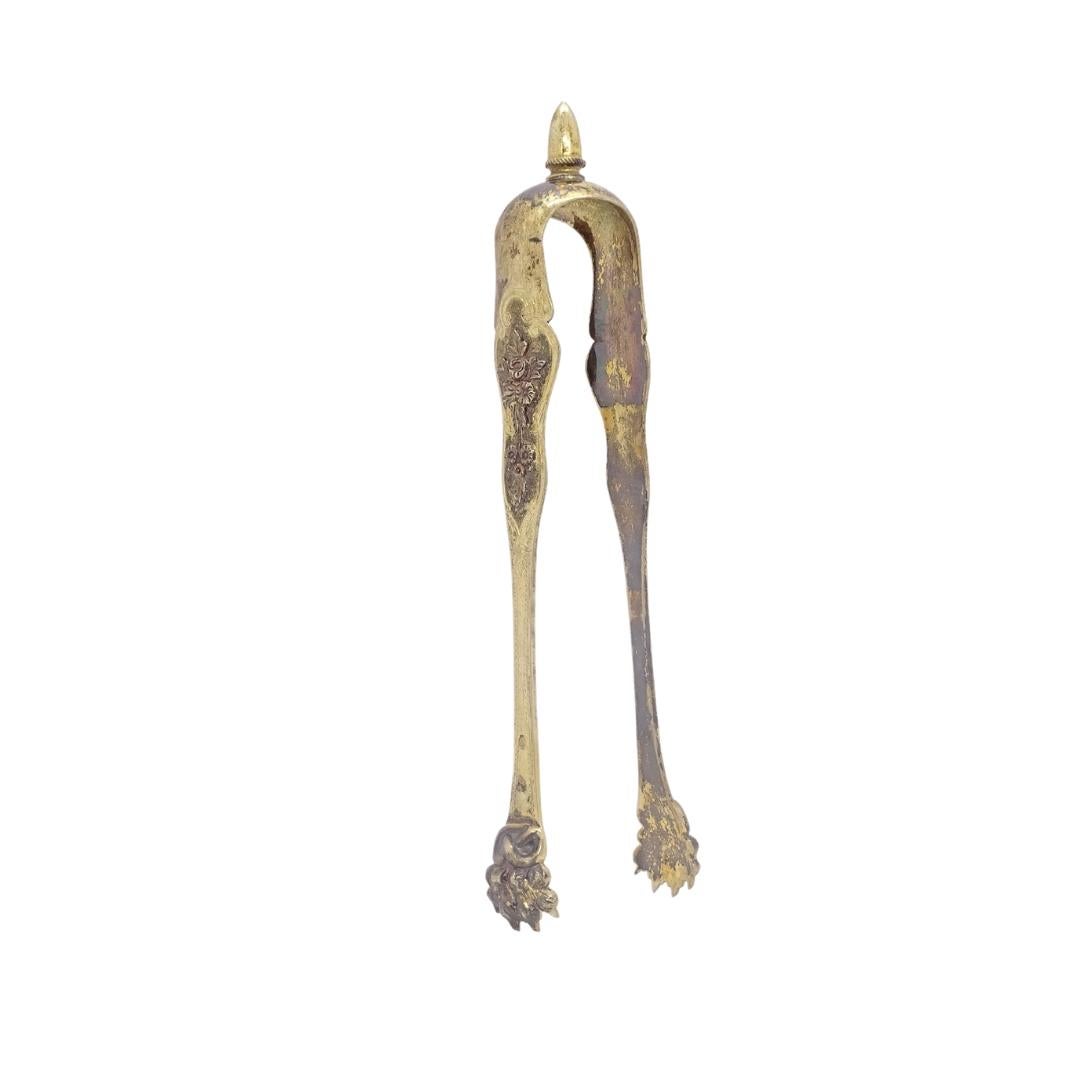 Tipo: Pinzas para azúcar, pinzas de mesa

Materiales: plata vermeille

Periodo: Napoleón III

País: Francia

Defectos menores que no interfieren en la visión general del conjunto.

Dimensiones: 16 x 5 x 3 cm

Curiosas pinzas para azúcar o pinzas de