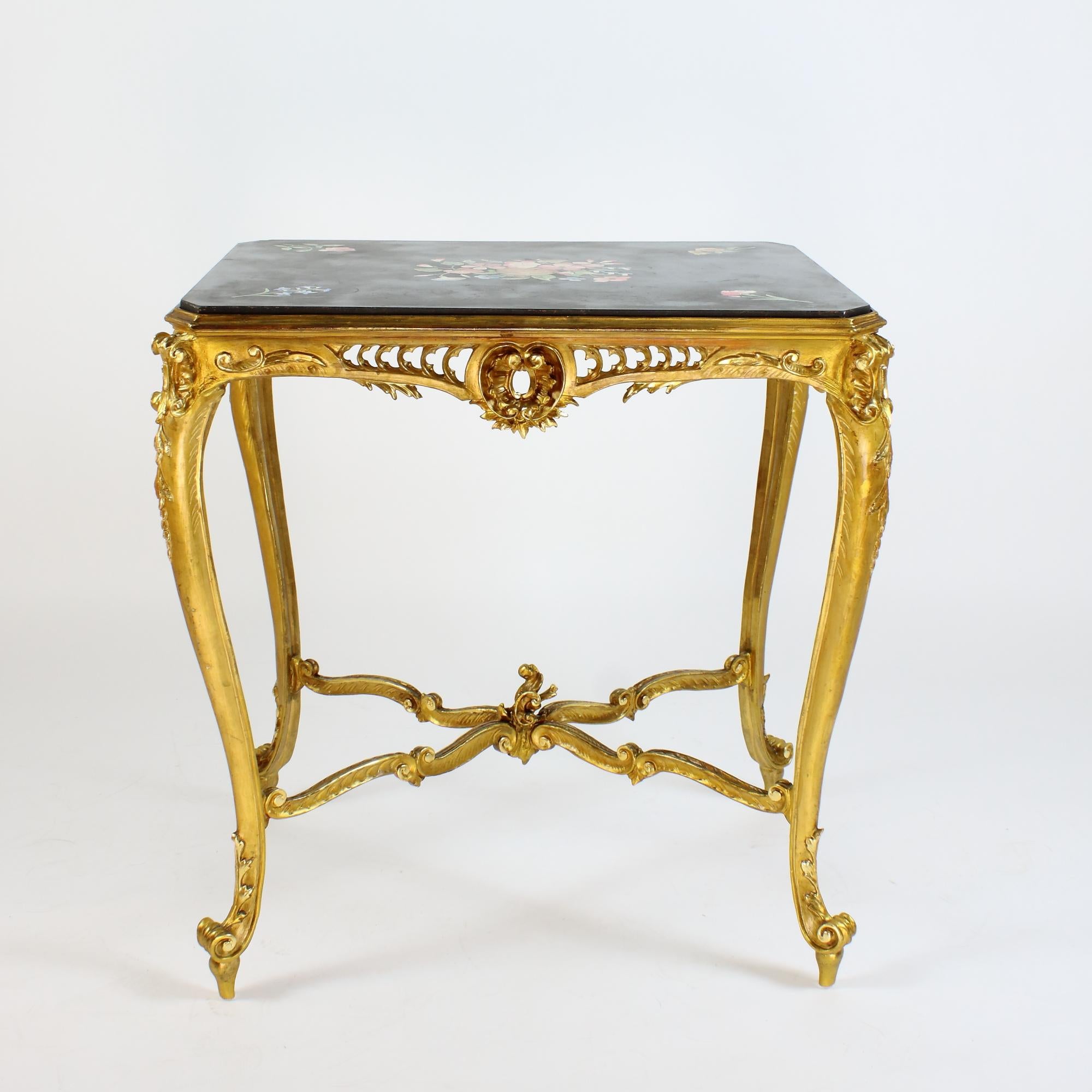 Napoleon III Louis XV style giltwood scagliola top center table dessert table

Ornamental octogonal table frame with rich, partially openwork carved Louis XV style rocaille decoration on four curved and taperring legs with scoll feet and rocaille