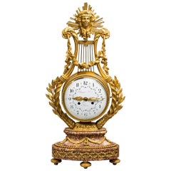 Horloge Lyre Napoléon III avec aiguilles en bronze doré