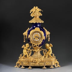 Napoleon III Mantel Clock in Bleu de Sèvres Porcelain & Chased Ormolu - 21.2 in