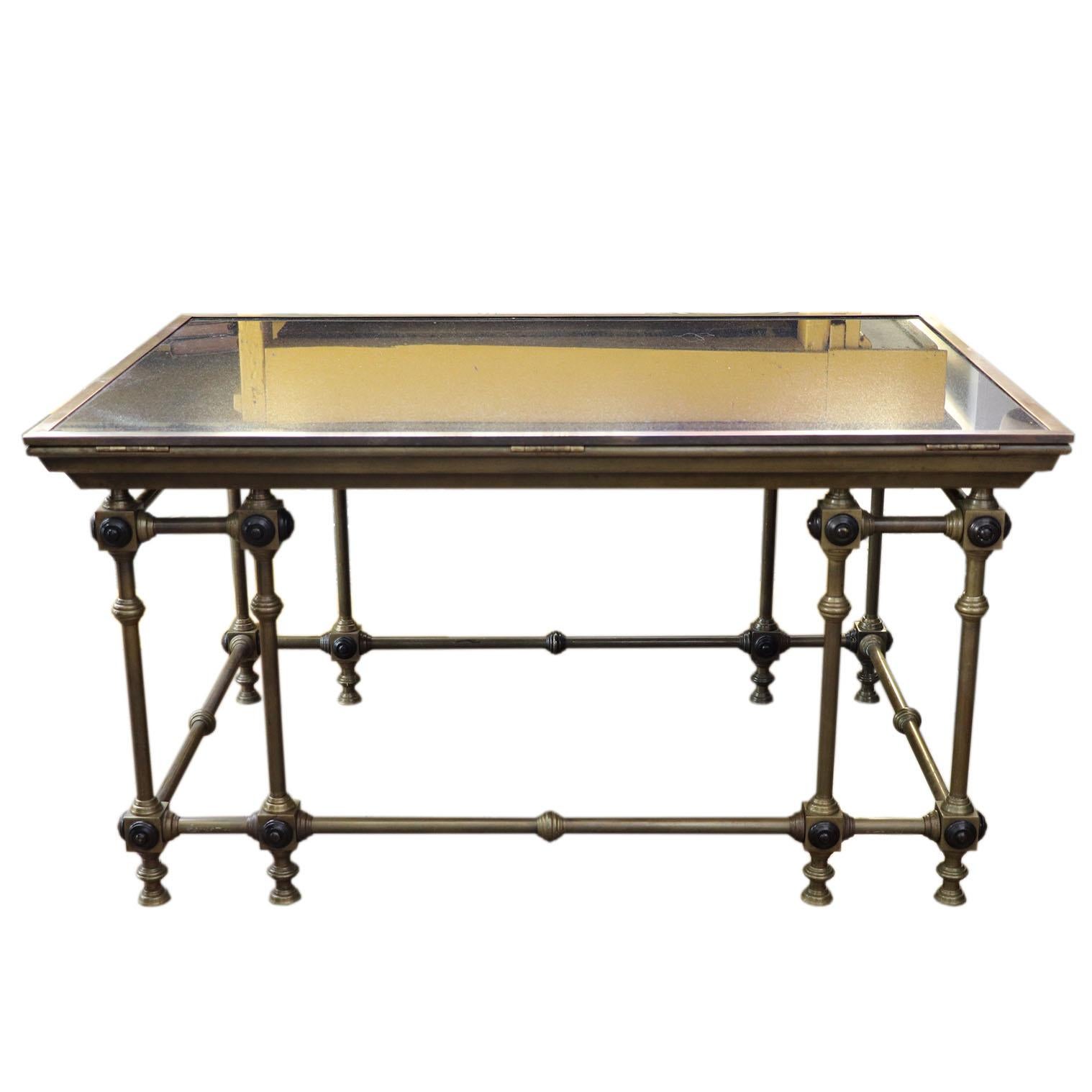 Cast your eyes upon this extraordinary work of art - a map brass frame case that has been masterfully transformed into a coffee table that is both functional and visually stunning. The map case, which has been given a new lease of life, now serves