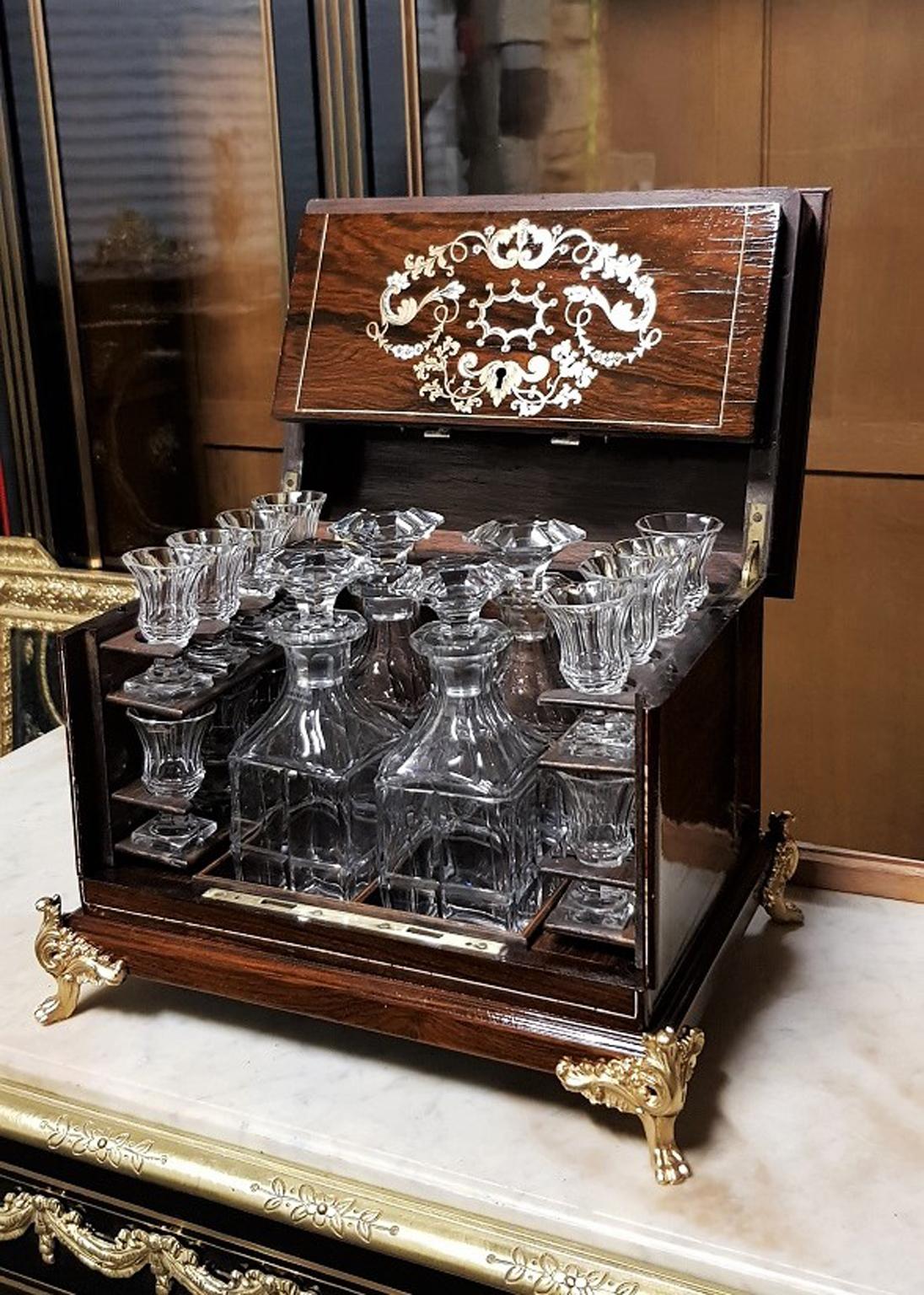ELegant Liquor cellar Cave a Liqueur in blackened fruit wood, a beautiful marquetry including pewter, copper and bone and gilt bronze feet. And an incredible All Baccarat crystal inside, Harcourt model , with 4 carafes and 16 glasses.
Napoleon III,