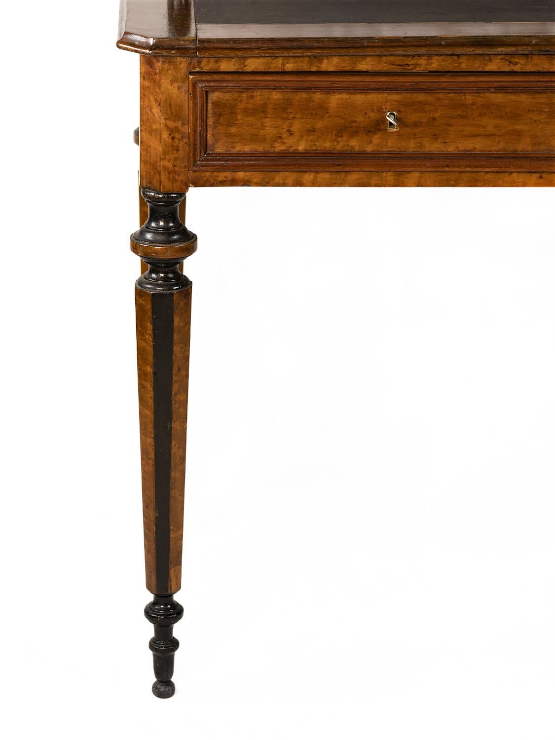 A unique 19th century Napoleon III desk Bonheur Du Jour in walnut and mahogany. 
Upper part showcase with three shelves and lower part with a couple of drawers and extendable top and legs with black lacquered doucine finish.