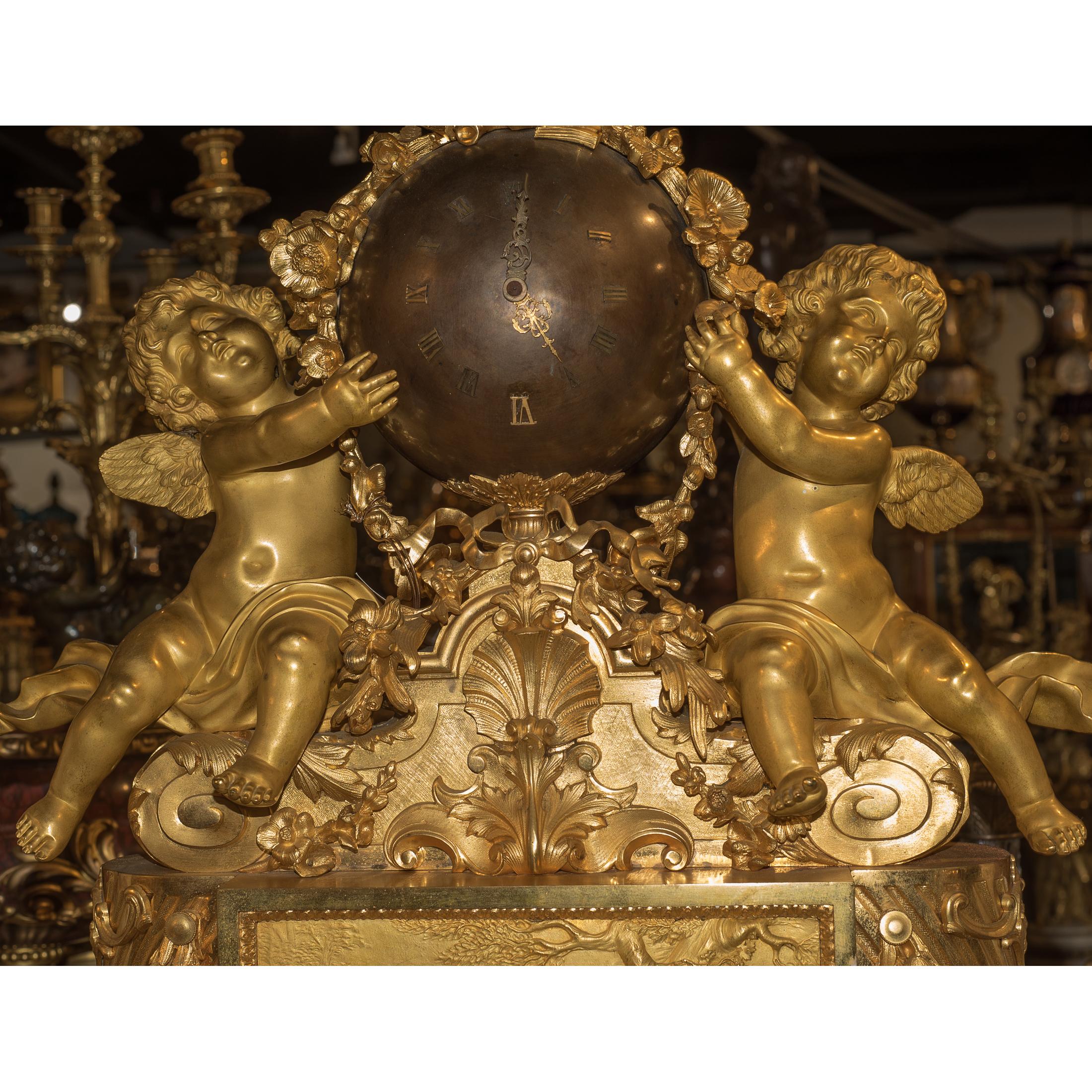 With two putti flanking the bronze spherical clockface, topped by a garlanded trophy, the movement stamped BR DENIERE A PARIS/2197

Maker: Jean-François Denière (1774-1866)
Origin: Paris, France
Size: 29 x 24 1/2 x 10 1/2 inches.