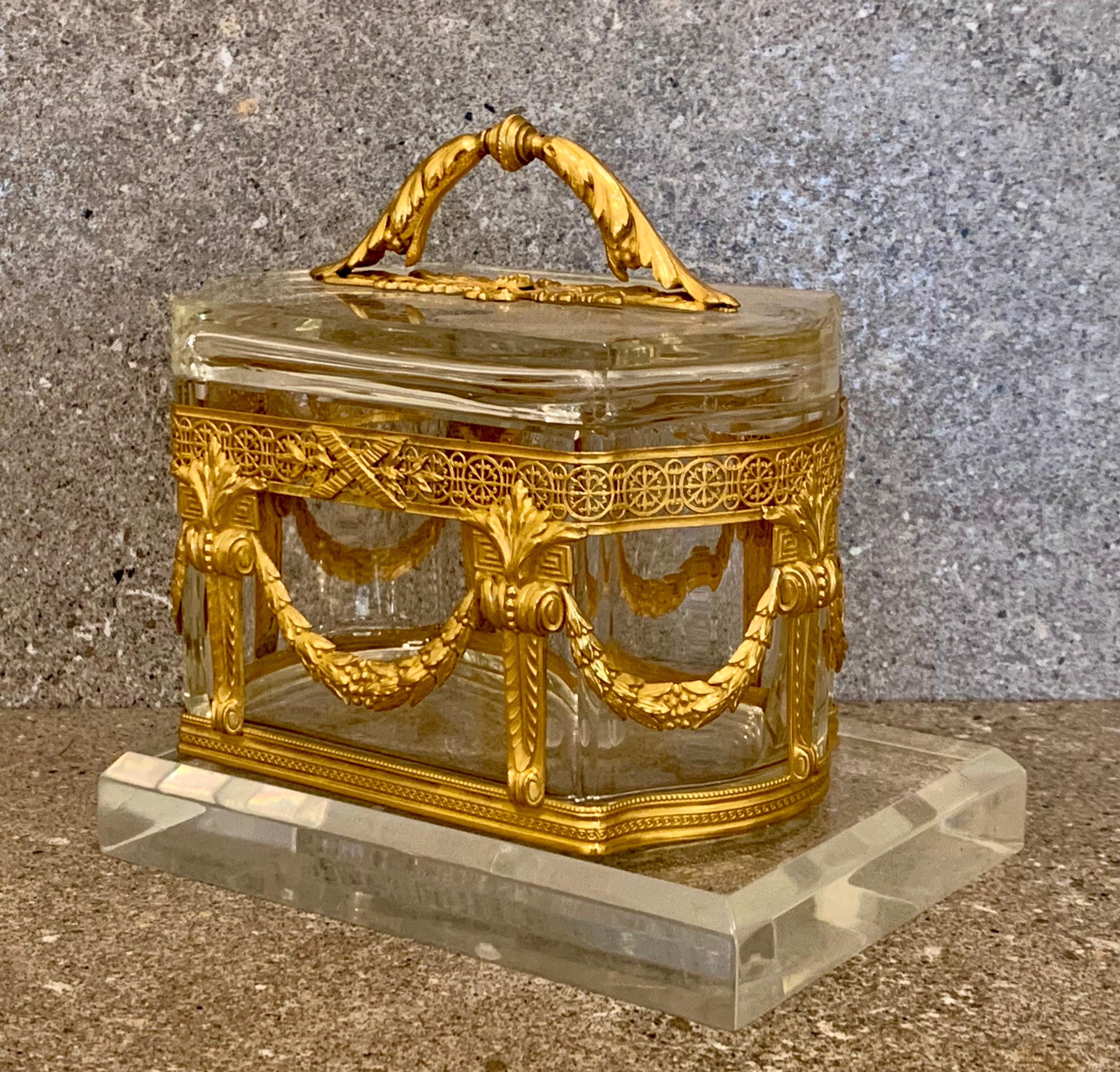 Perfectly executed in heavy crystal glass and bronze. A superb example
of a French casket. This fine box is decorated with high quality ormolu mounts.