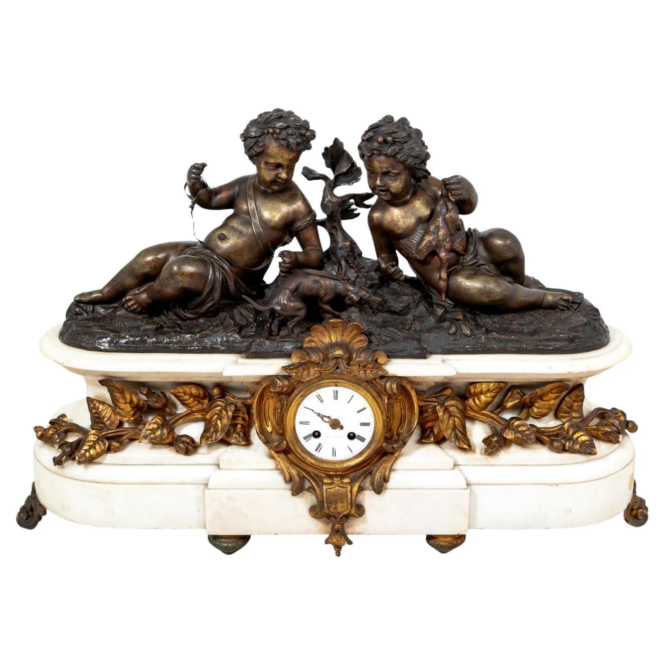 Horloge Napoléon III en bronze patiné et marbre