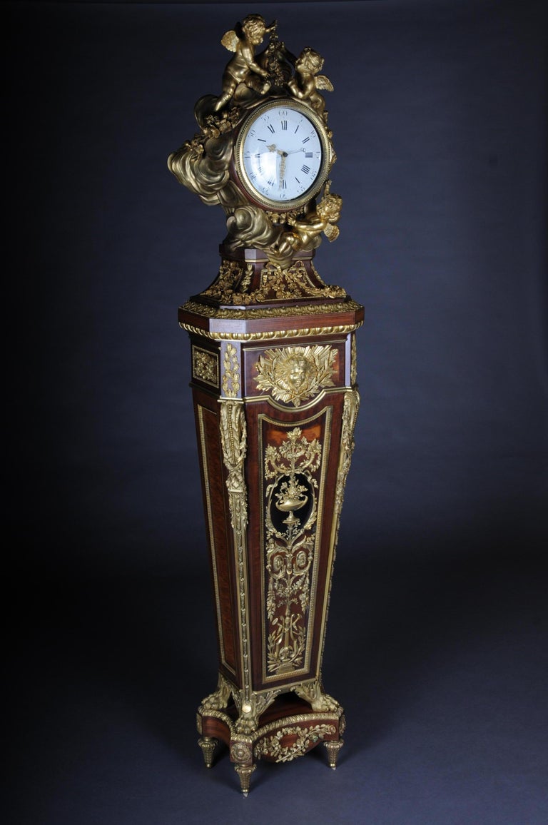 A Model of Jean Henri Riesener (Received Master in 1768) executed in 1785. (inv. OA 5501 In Louvre Museum). 19th Century. This fine and sumptuous “Regulateur de Pendule” presents a fine amaranth. Of Sycamore oeuil de vermeuil, ebony and buis