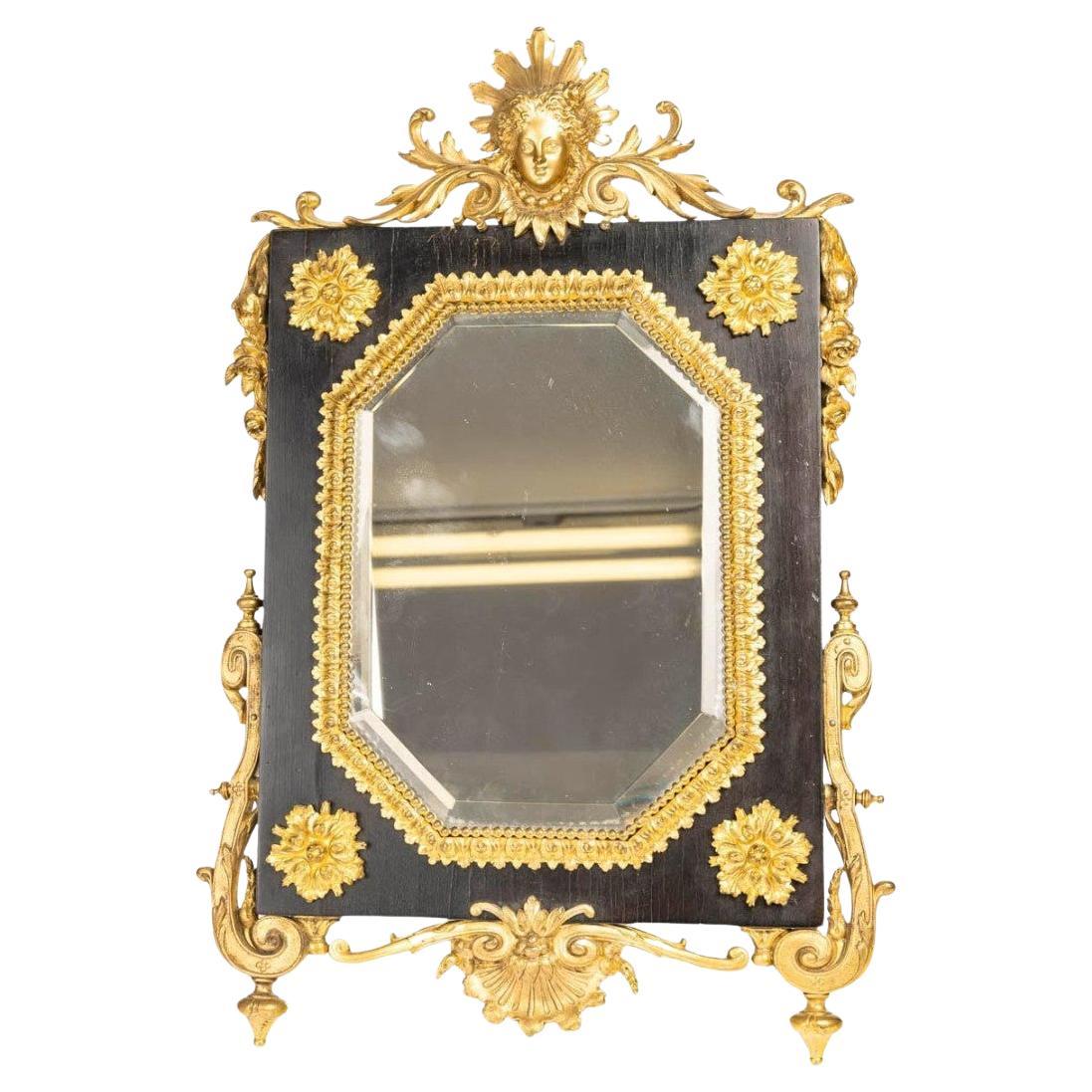 Napoleon III period chased gilt bronze table mirror.