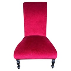 Napoleon III period chauffeuse in red velvet