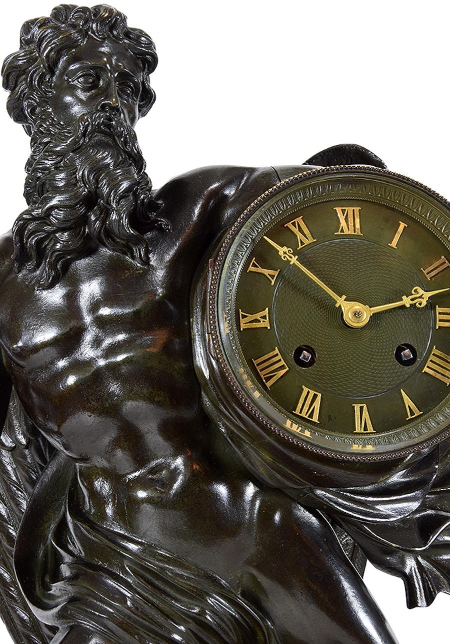 Napoleon III period clock with a magnificent patinated bronze sculpture of the god Chronos holding a scythe. 
Original mechanism without modification, hour and half-hour striking on old bell.
Spiral escapement.
Dimensions: Height : 44cm x width :