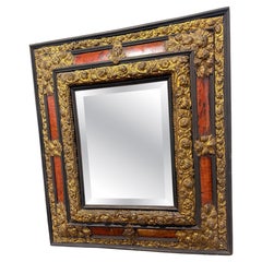Napoleon III Period, Embossed Brass and Faux Tortoiseshell Ebonized Mirror