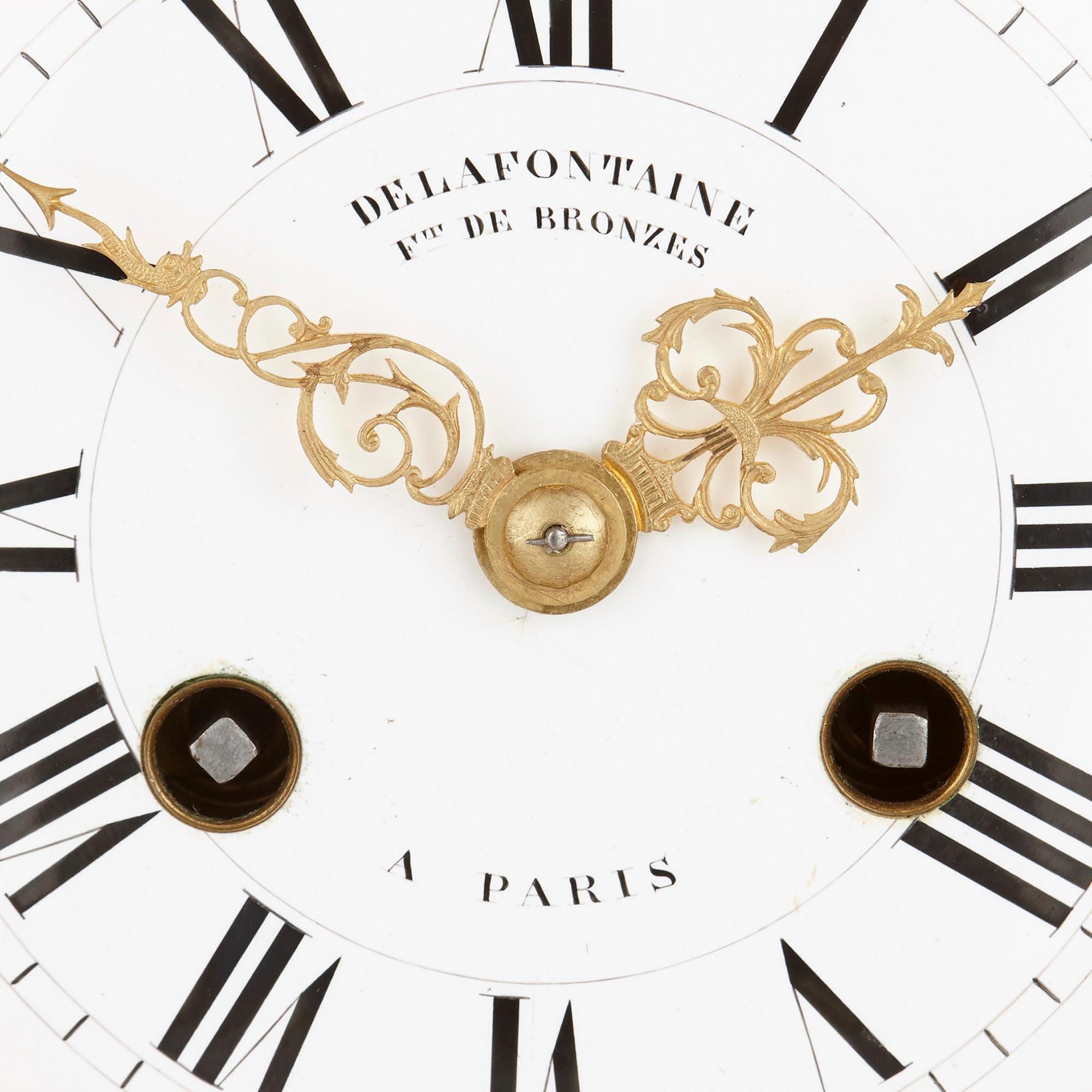 Patiné Horloge d'époque Napoléon III en bronze doré et patiné par Delafontaine en vente