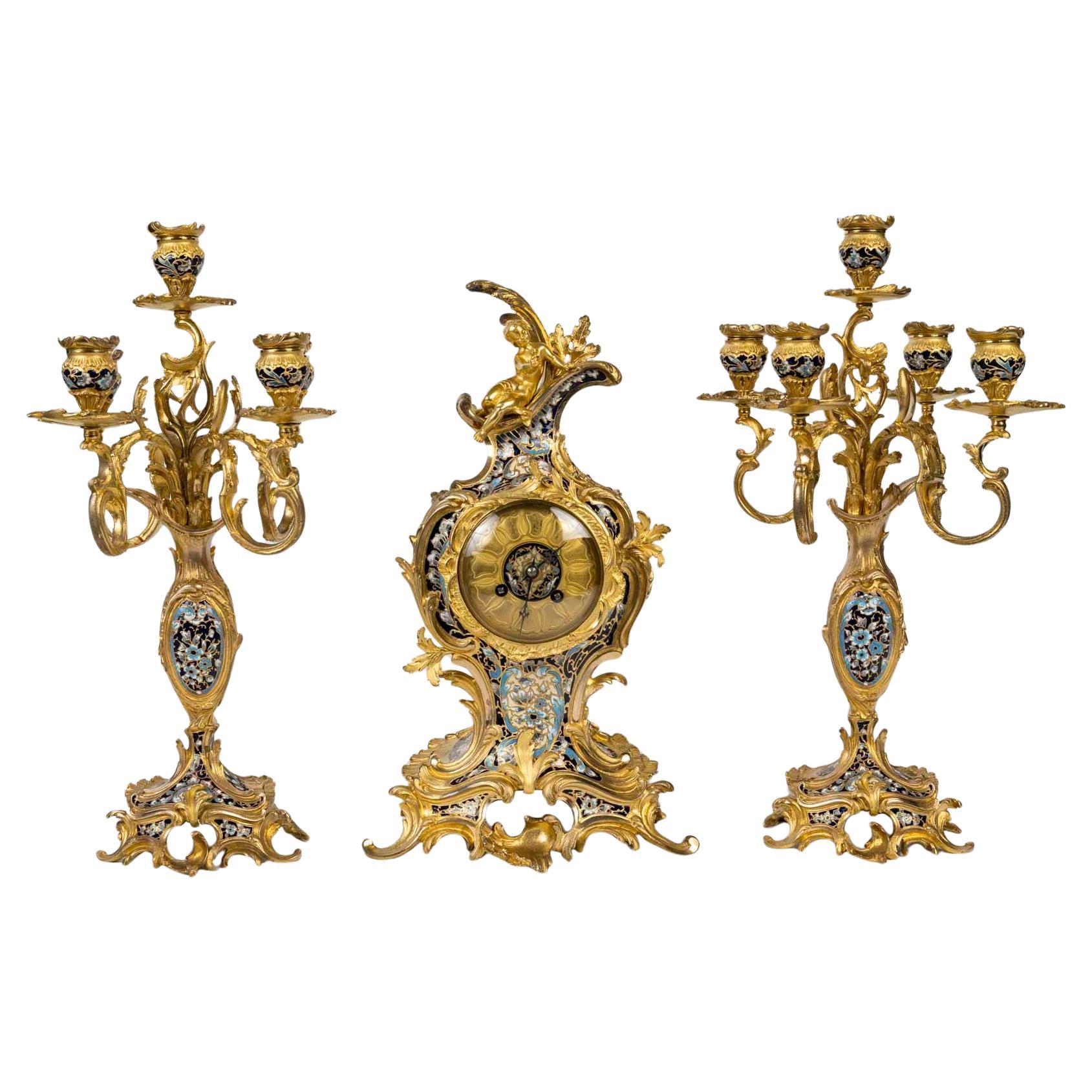 Napoleon III Period Gilt Bronze and Enamelled Mantel Set, 19th Century.